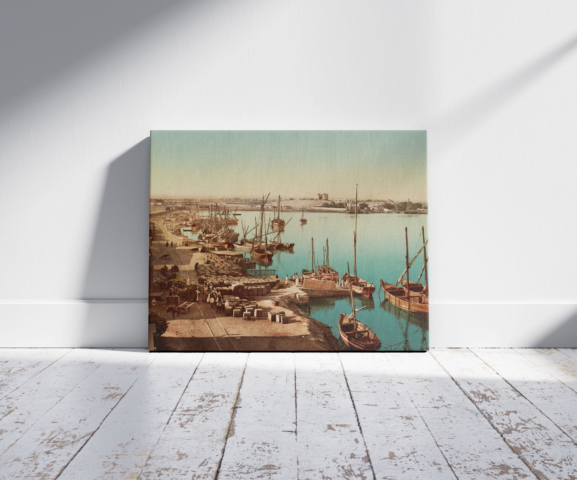 A picture of Suez, le port, a mockup of the print leaning against a wall