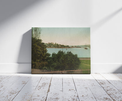 A picture of Sydney Harbour, a mockup of the print leaning against a wall