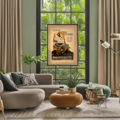 A picture of Team work wins! Your work here makes their work over there possible With your help they are invincible, without it they are helpless /, a mockup of the print leaning against a wall