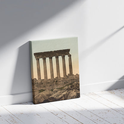 A picture of Temple of the Sun, front view, Baalbek, Holy Land, (i.e., Ba'labakk, Lebanon), a mockup of the print leaning against a wall