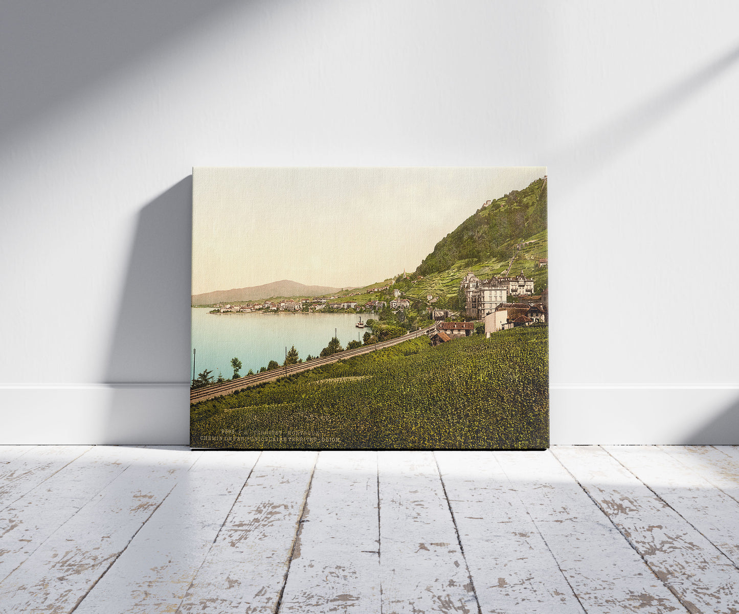 A picture of Territet-Montreaux, (i.e., Montreux), funicular railway, Geneva Lake, Switzerland, a mockup of the print leaning against a wall
