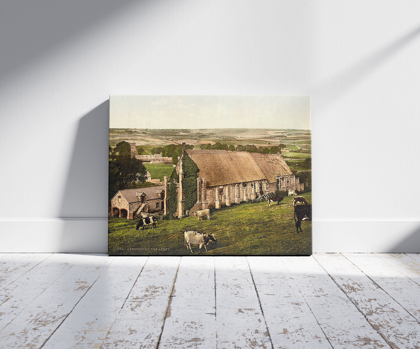 A picture of The Abbey, Abbotsbury, England, a mockup of the print leaning against a wall