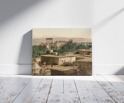 A picture of The Acropolis, Baalbek, Holy Land, (i.e., Baʻlabakk, Lebanon), a mockup of the print leaning against a wall