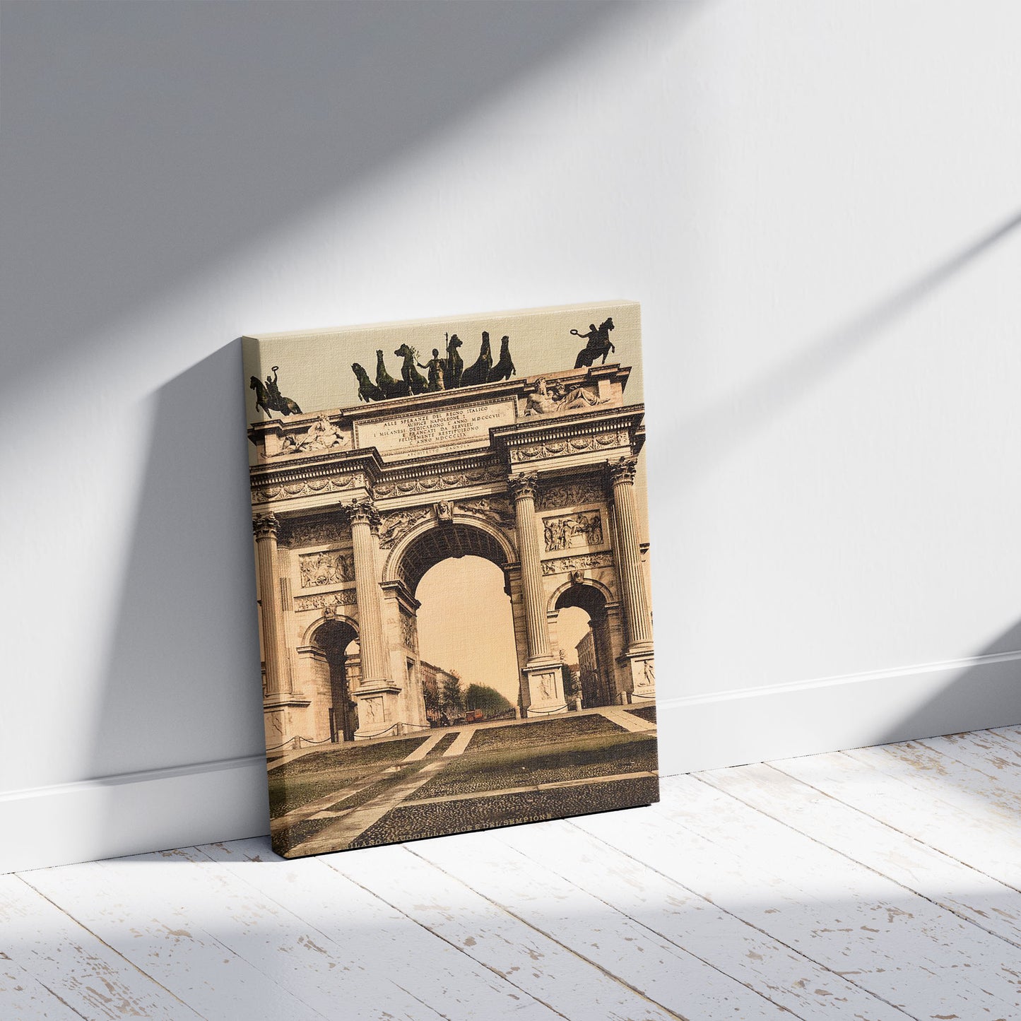 A picture of The Arch of Peace, Milan, Italy, a mockup of the print leaning against a wall