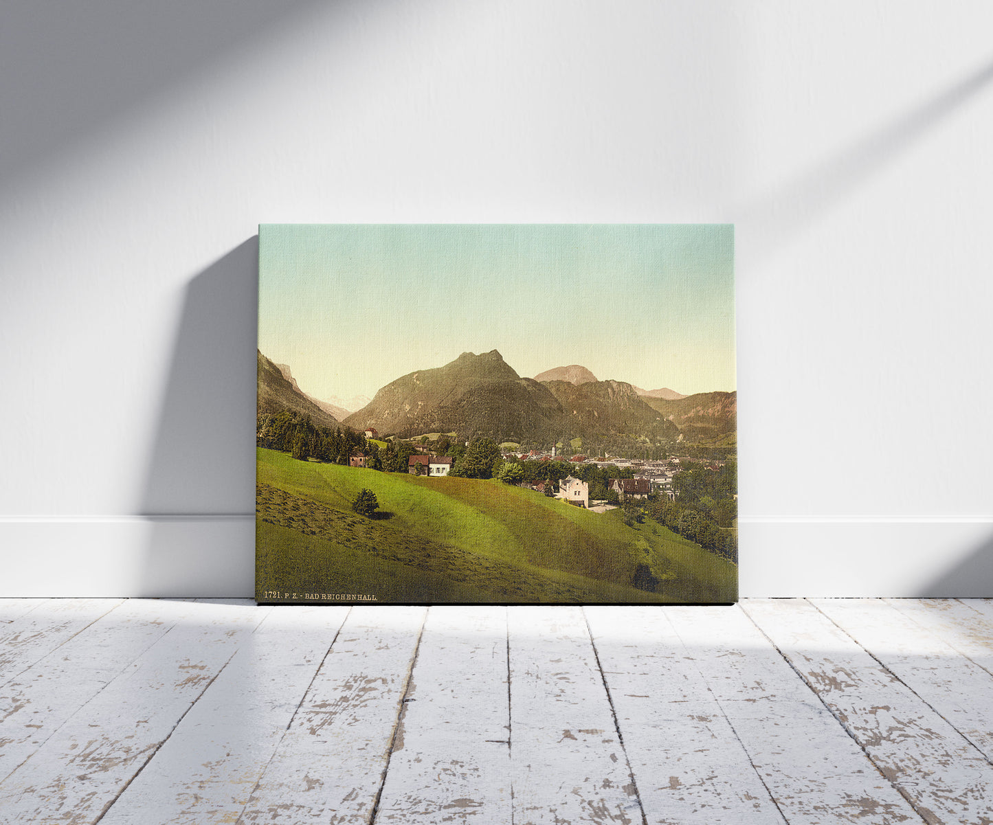 A picture of The baths towards the Lofererberge, Reichenhall, Bavaria, Germany, a mockup of the print leaning against a wall