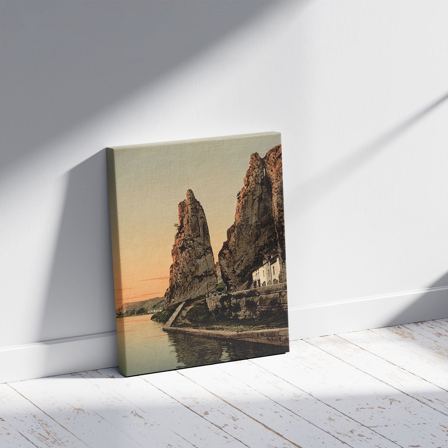 A picture of The Bayard Rock, Dinant, Belgium, a mockup of the print leaning against a wall