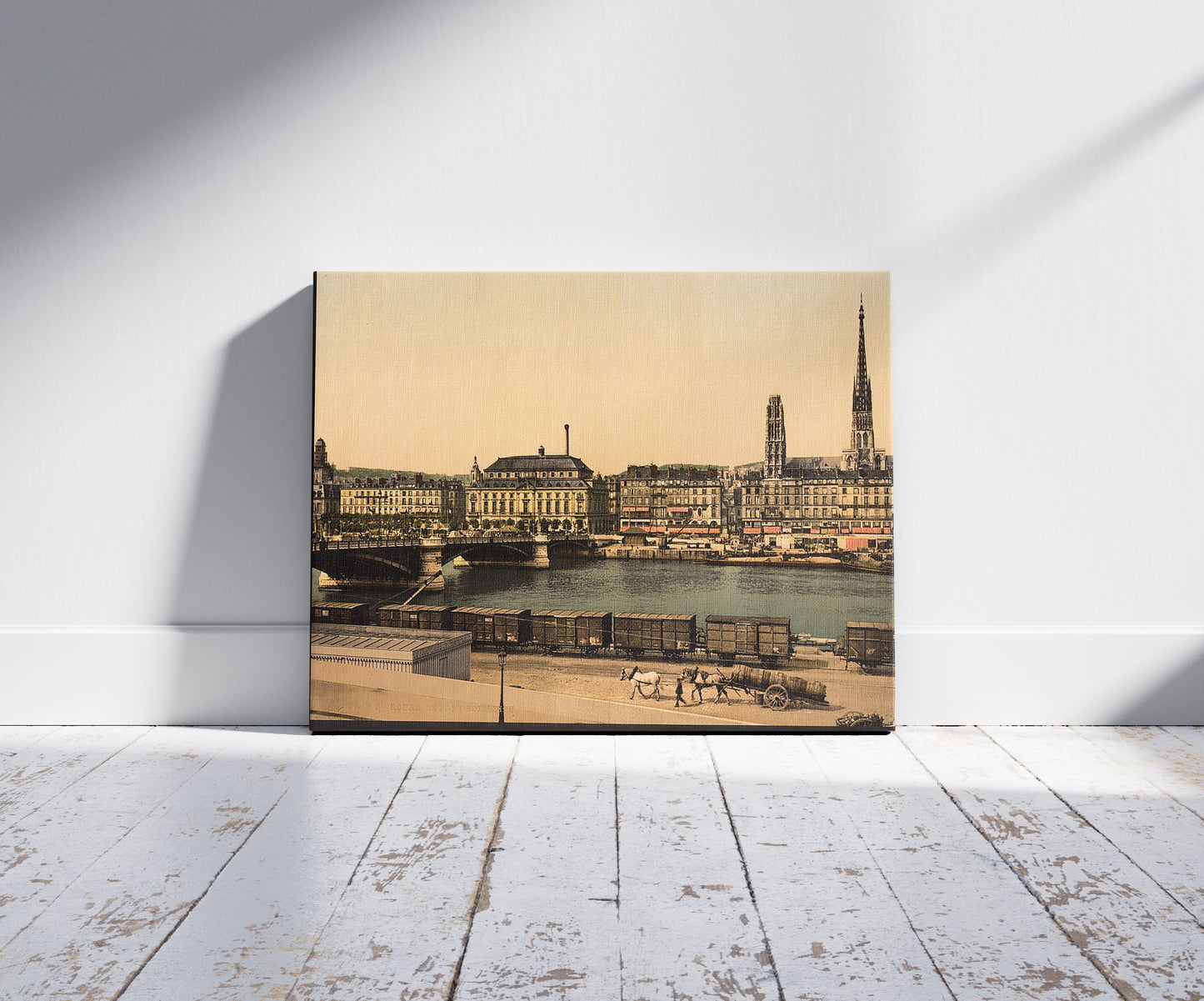 A picture of The Boieldieu Bridge from St. Sever, Rouen, France, a mockup of the print leaning against a wall