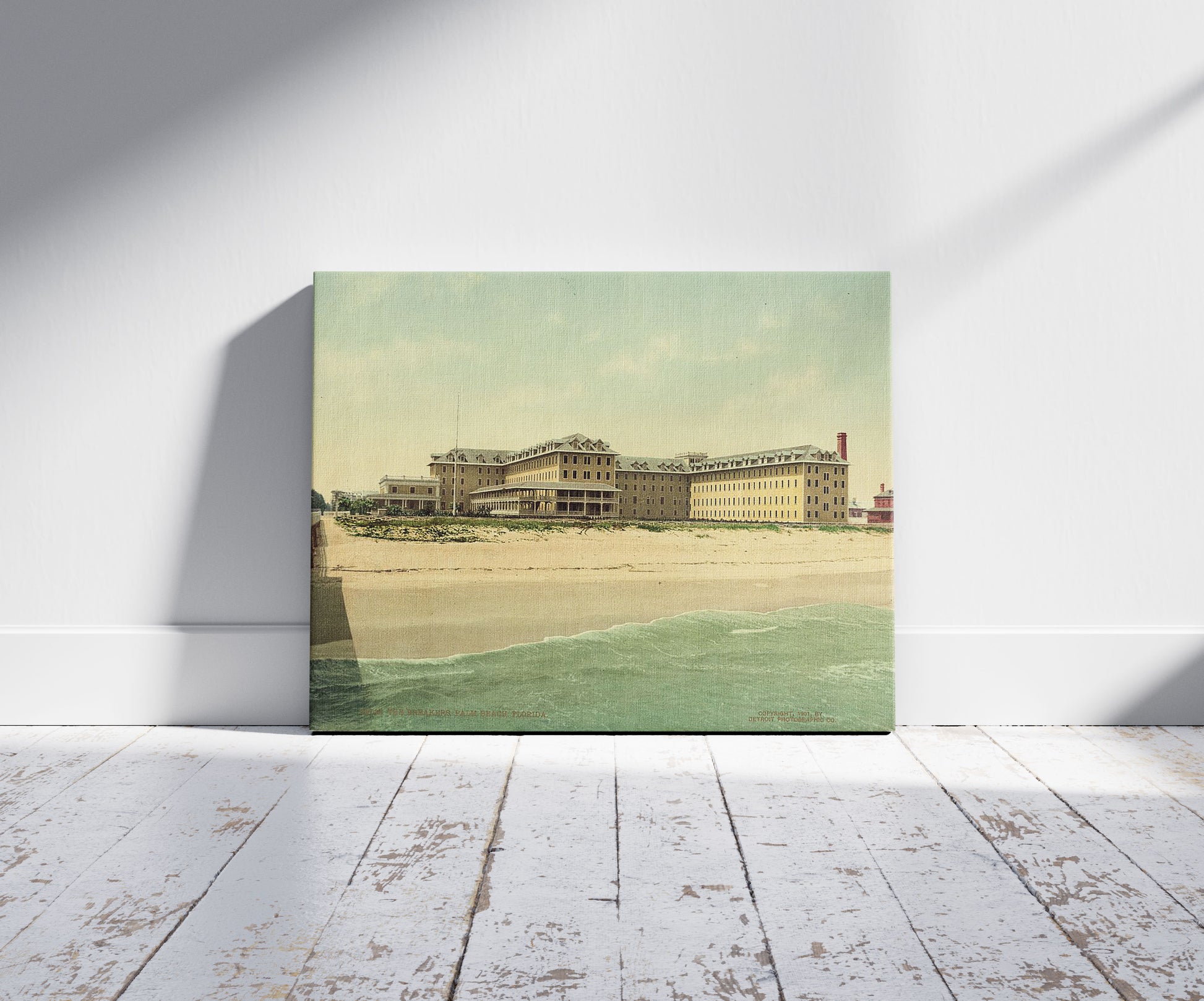 A picture of The Breakers, Palm Beach, Florida, a mockup of the print leaning against a wall