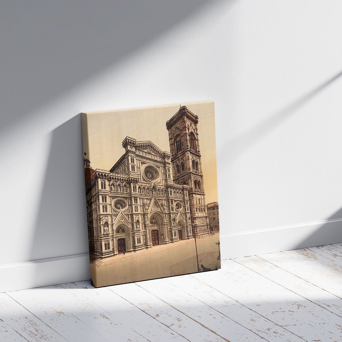 A picture of The Cathedral and campanile, Florence, Italy, a mockup of the print leaning against a wall