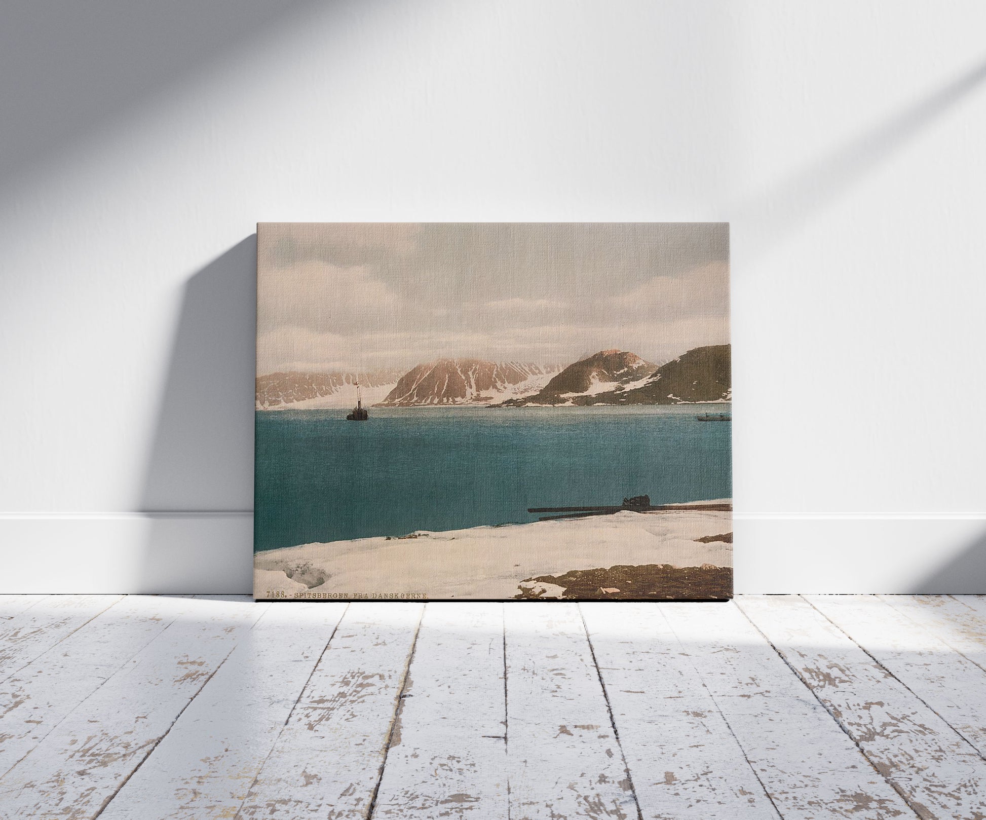 A picture of The Danskerne, Spitzbergen, Norway, a mockup of the print leaning against a wall