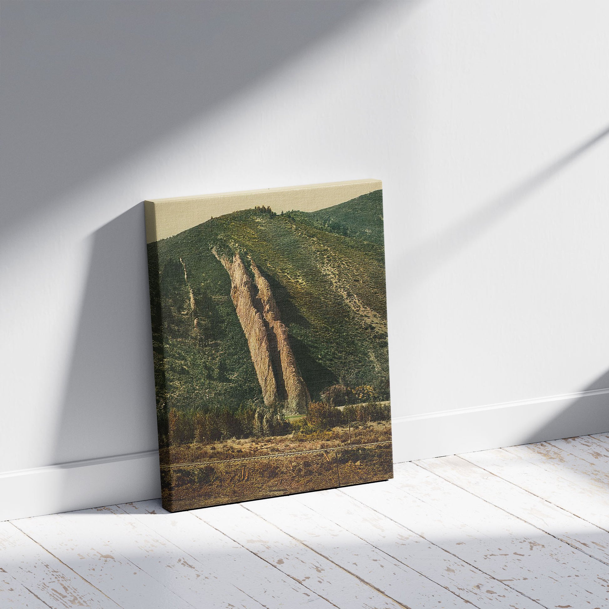 A picture of The Devil's Slide, a mockup of the print leaning against a wall