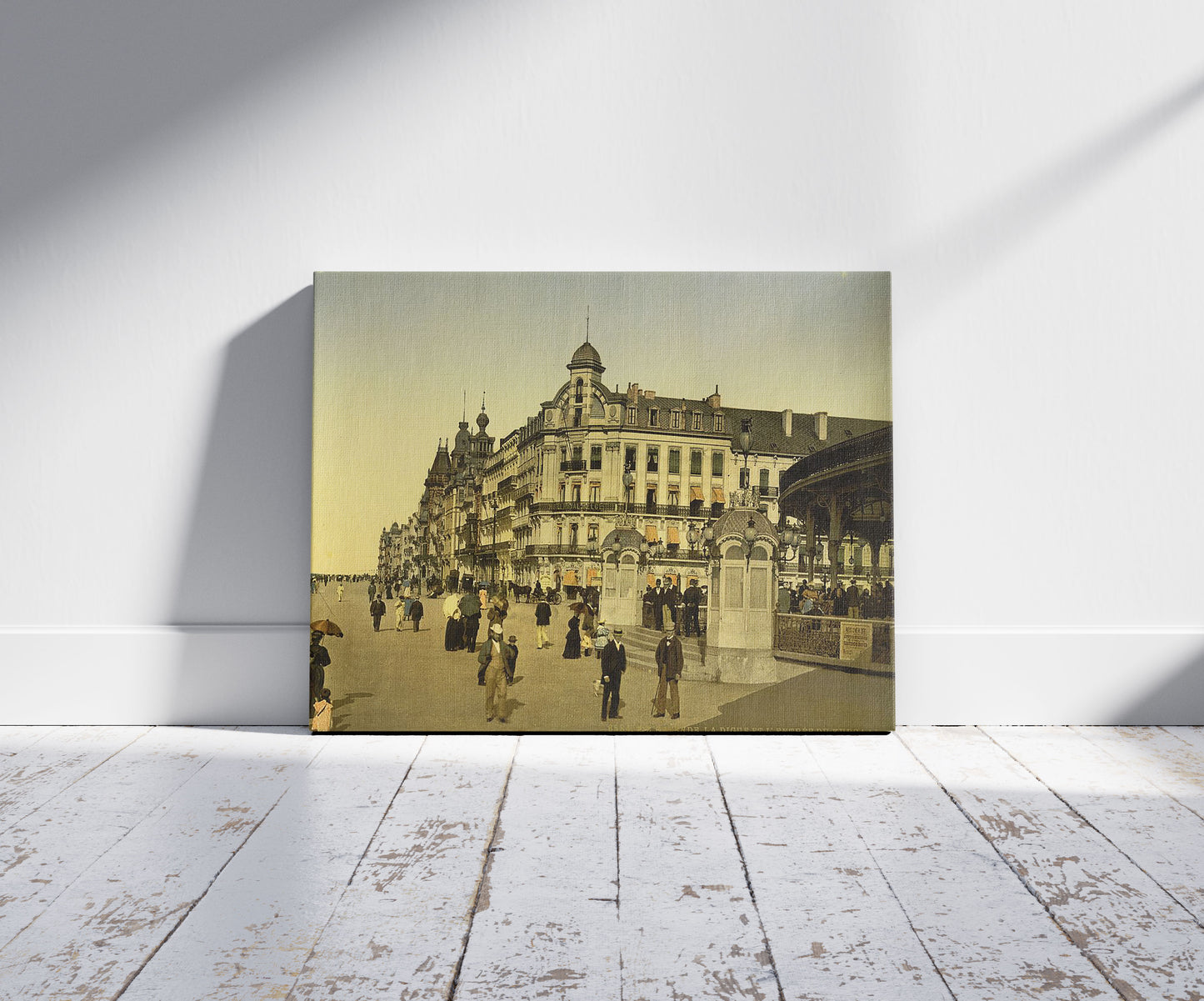 A picture of The embankment and entrance to the Kursaal, (i.e., Cursaal), Ostend, Belgium, a mockup of the print leaning against a wall