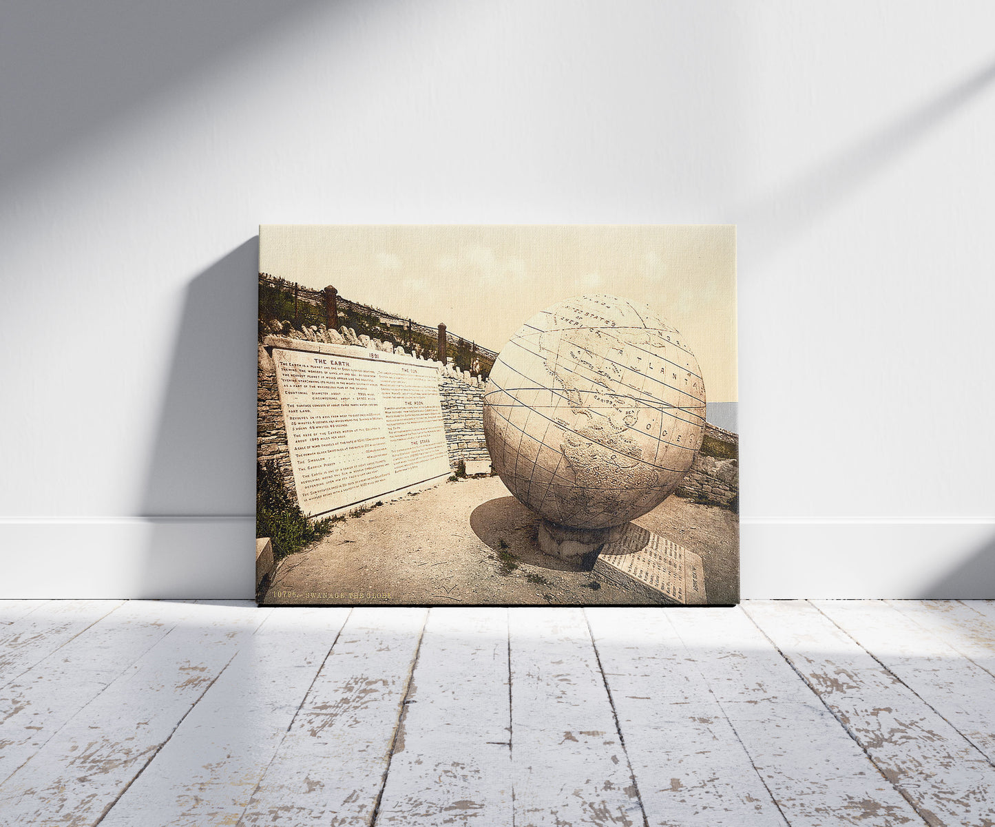 A picture of The Globe, Swanage, England, a mockup of the print leaning against a wall