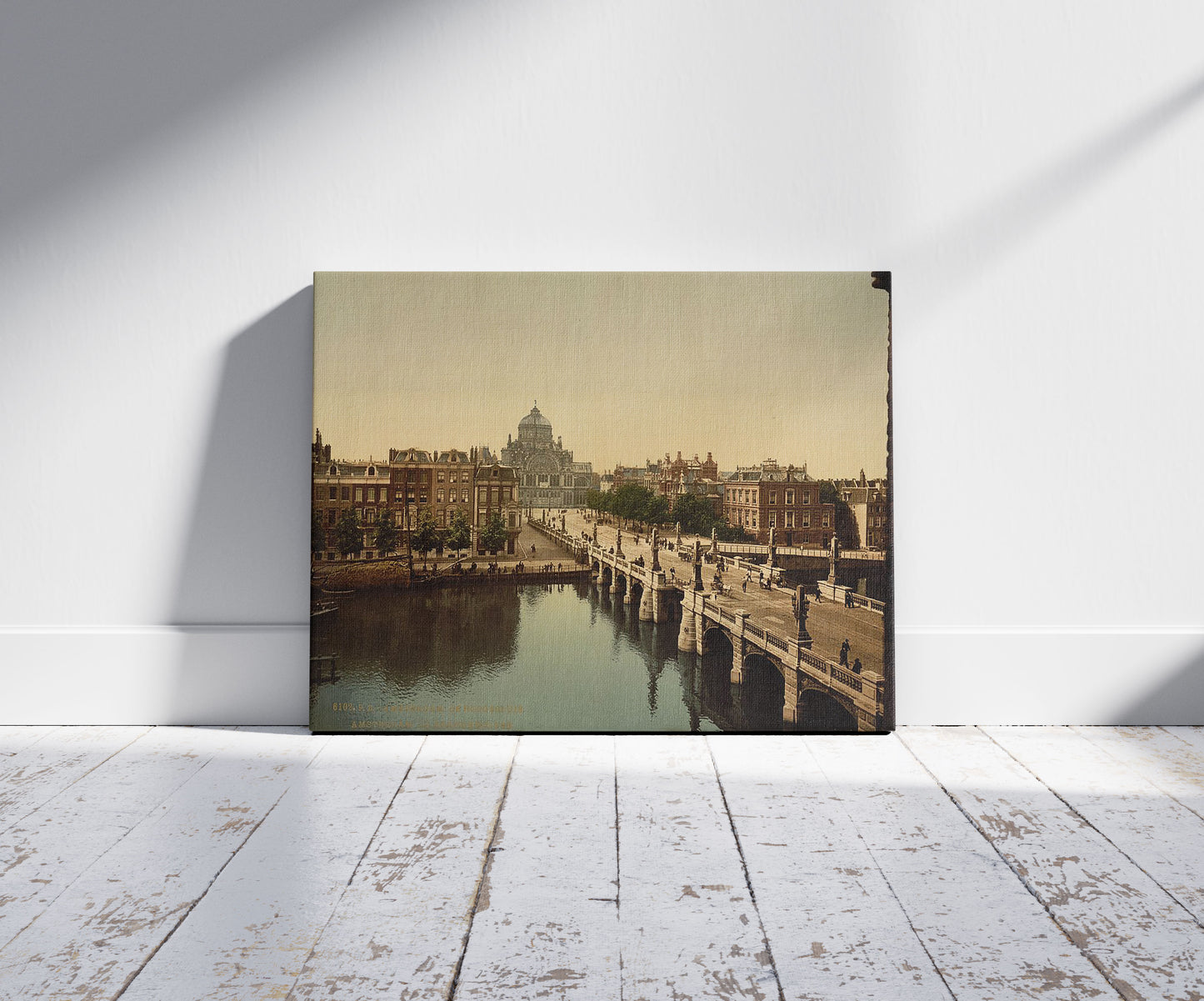 A picture of The great sluice, Amsterdam, Holland, a mockup of the print leaning against a wall