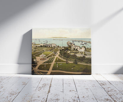 A picture of The Harbor, Kingstown. County Dublin, Ireland, a mockup of the print leaning against a wall