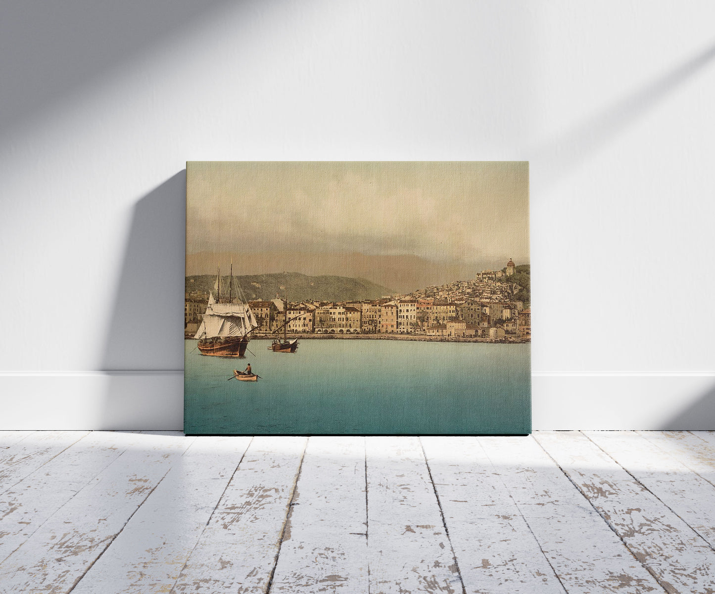 A picture of The harbor, San Remo, Riviera, a mockup of the print leaning against a wall