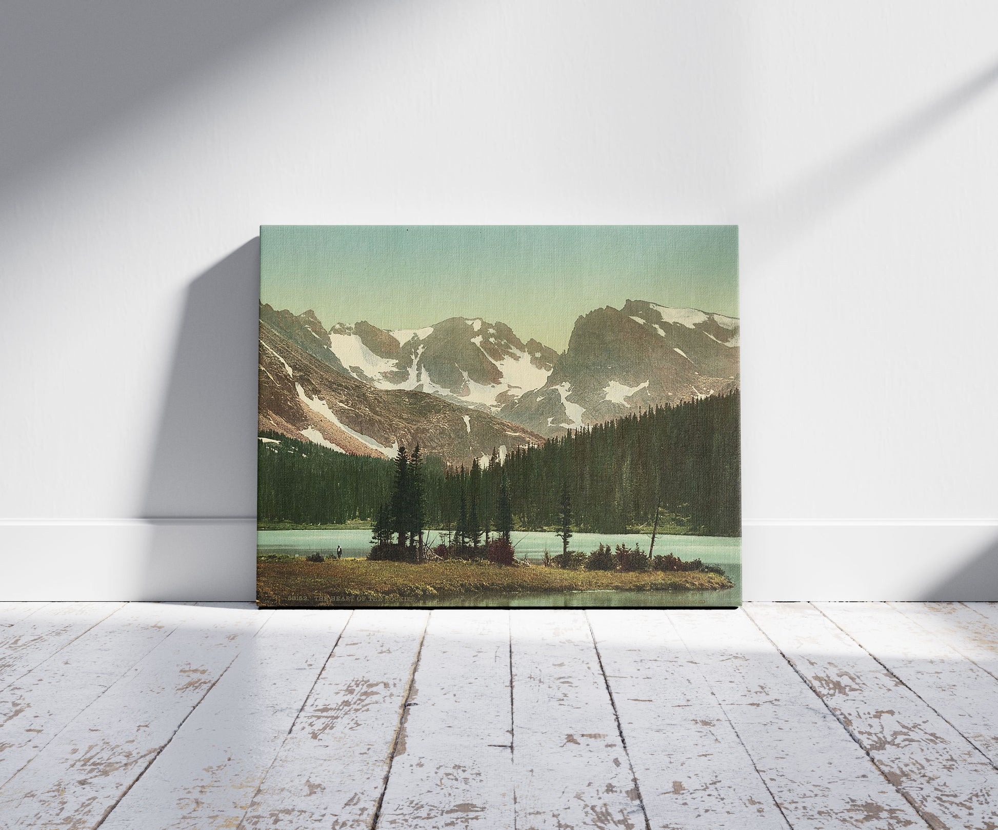 A picture of The heart of the Rockies, a mockup of the print leaning against a wall