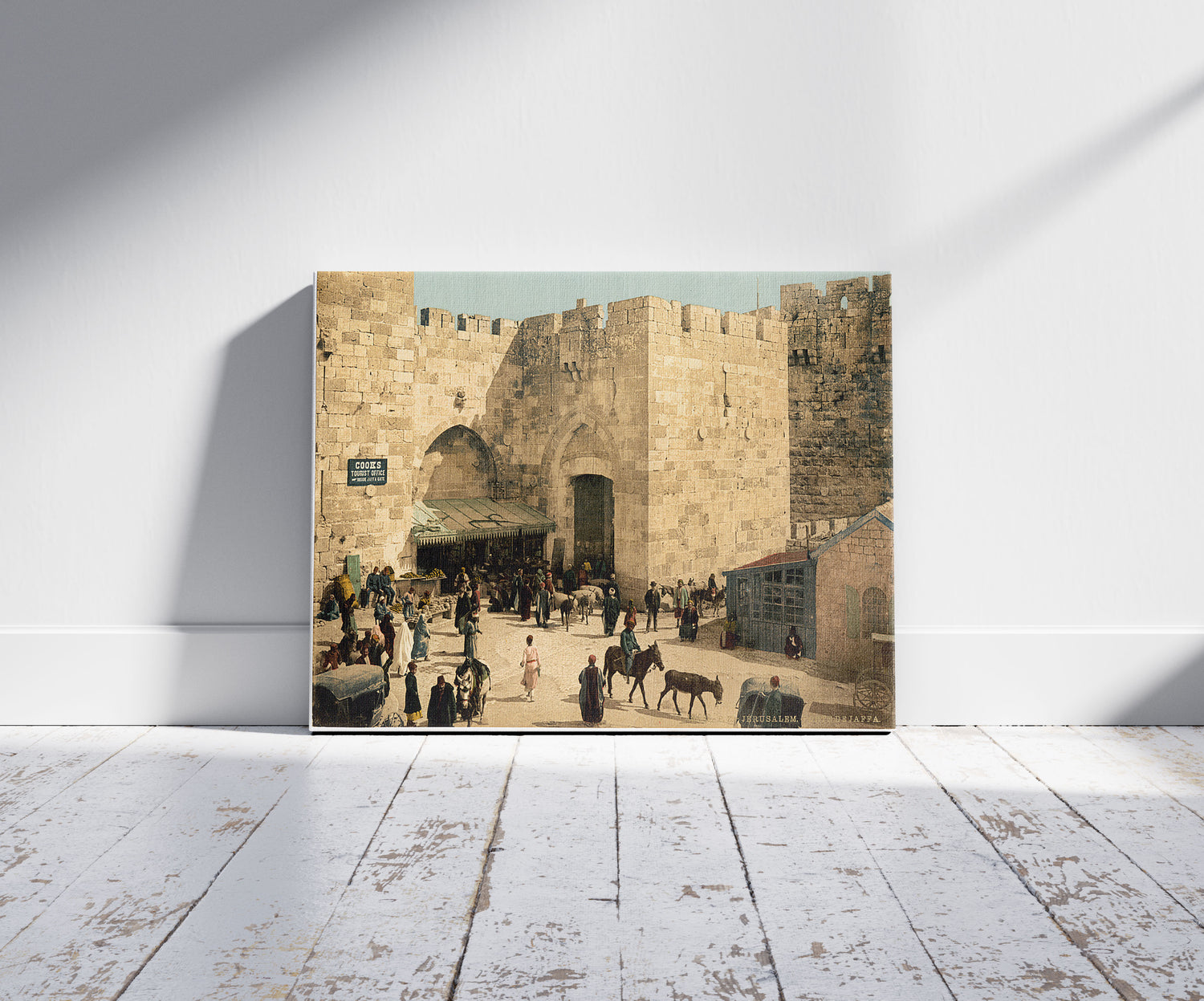 A picture of The Jaffa Gate, Jerusalem, Holy Land, a mockup of the print leaning against a wall