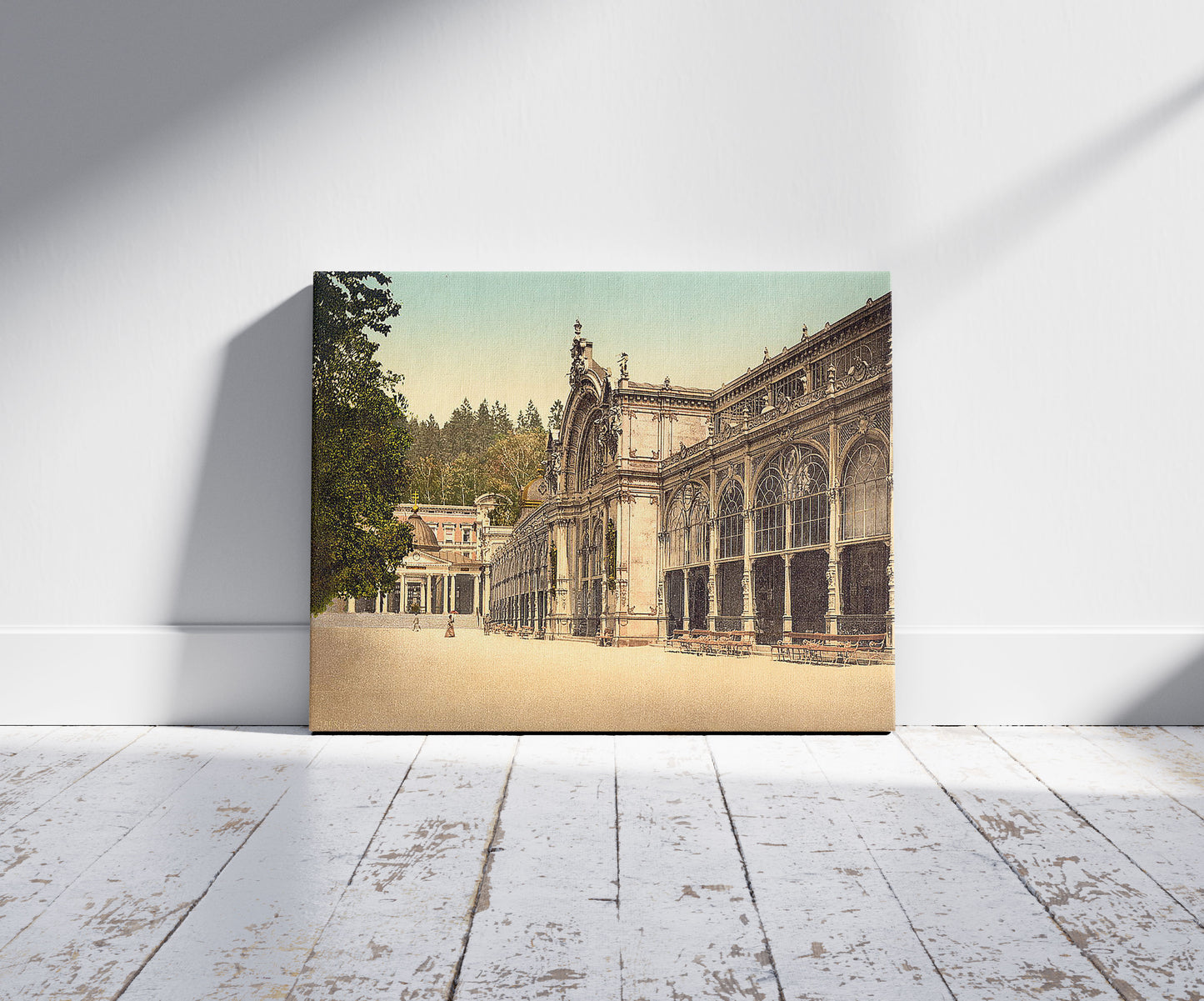 A picture of The Kruezbrunnen (i.e., Kreuzbrunnen) Colonnade, Marienbad, Bohemia, Austro-Hungary, a mockup of the print leaning against a wall