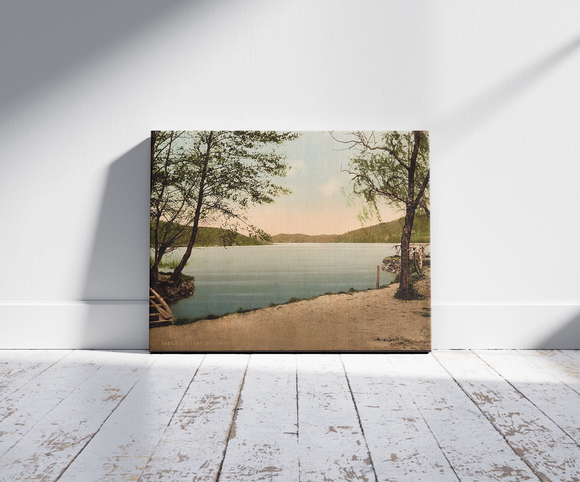 A picture of The Lake of Lourdes, Lourdes, Pyrenees, France, a mockup of the print leaning against a wall