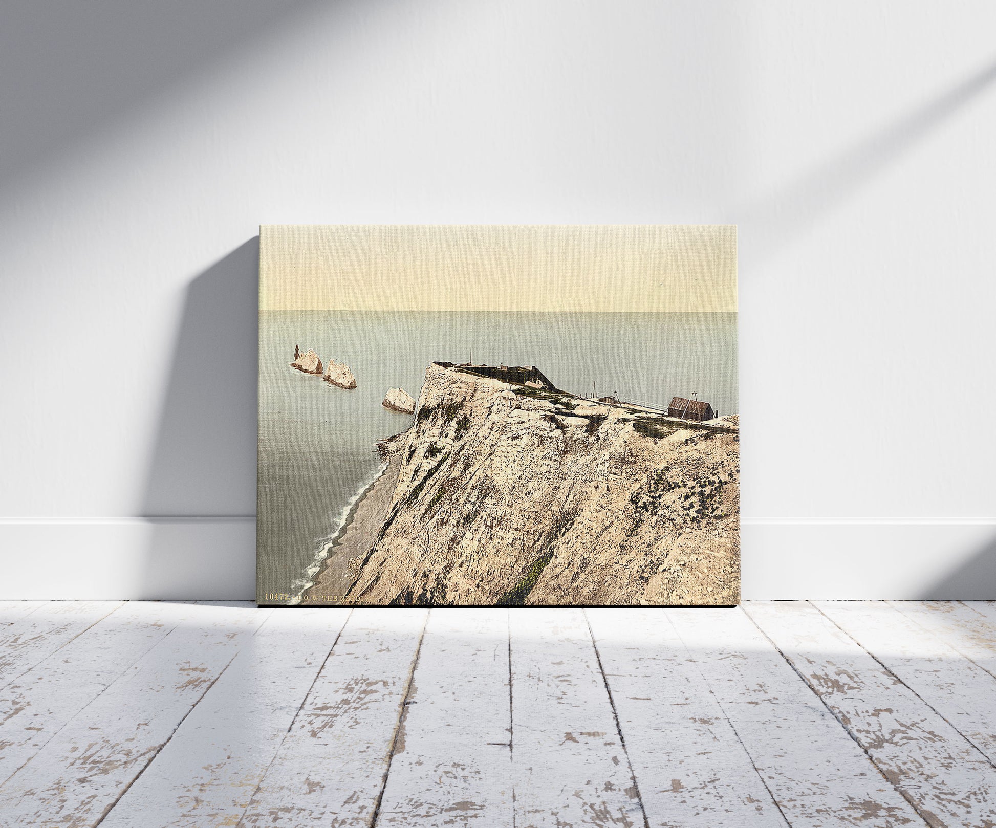 A picture of The Needles, II., Isle of Wight, England, a mockup of the print leaning against a wall