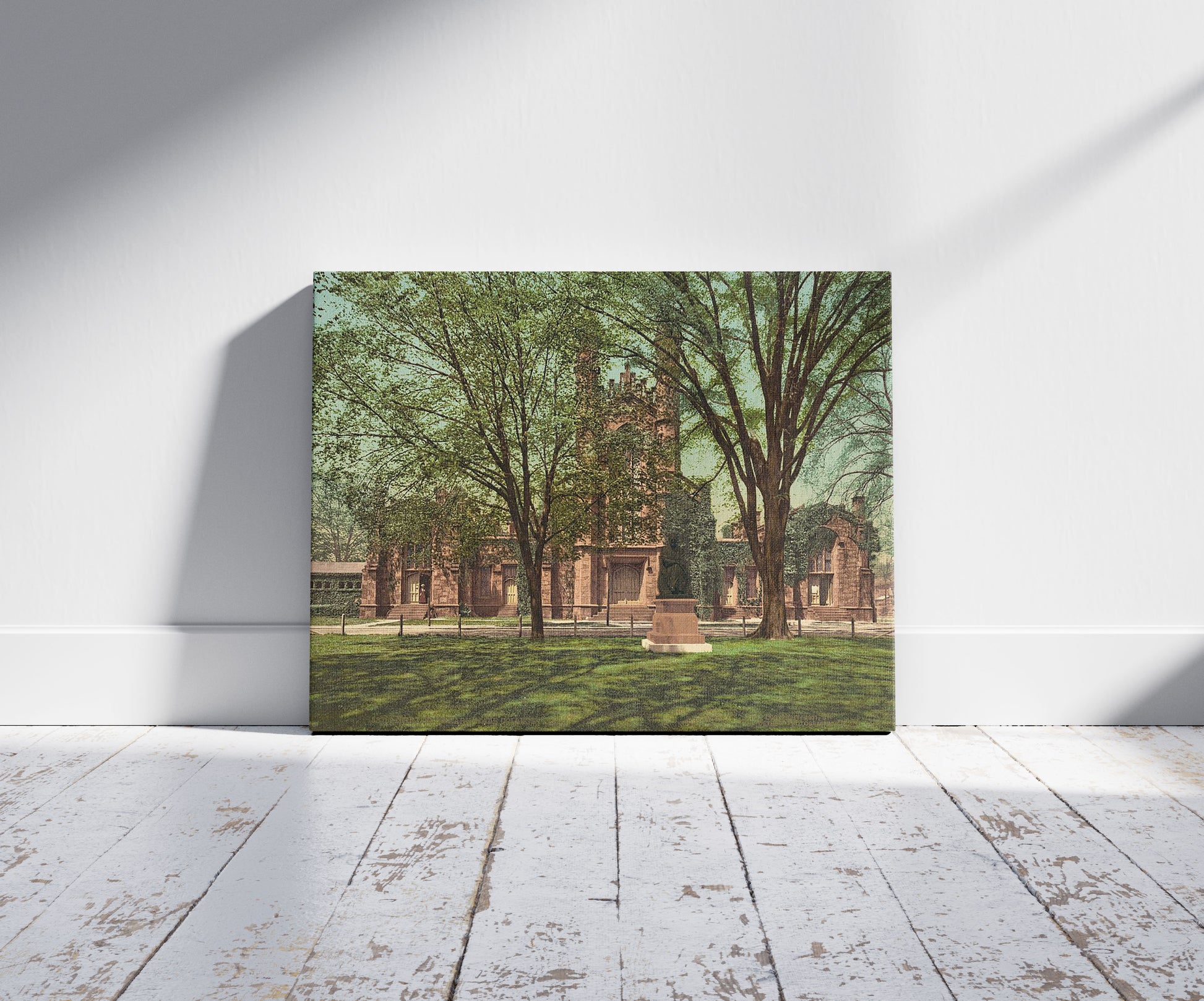 A picture of The Old library, Yale College, a mockup of the print leaning against a wall