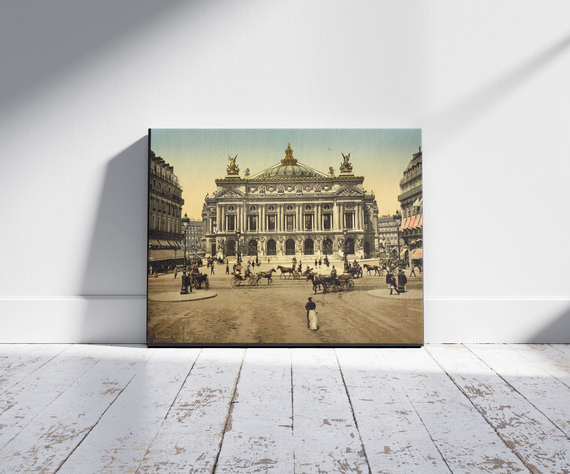 A picture of The Opera House, Paris, France, a mockup of the print leaning against a wall