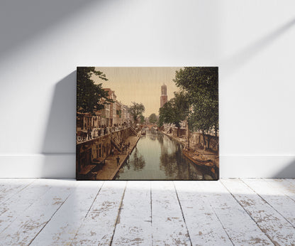 A picture of The Oude Gracht Hamburgerbrug, Utrecht, Holland, a mockup of the print leaning against a wall
