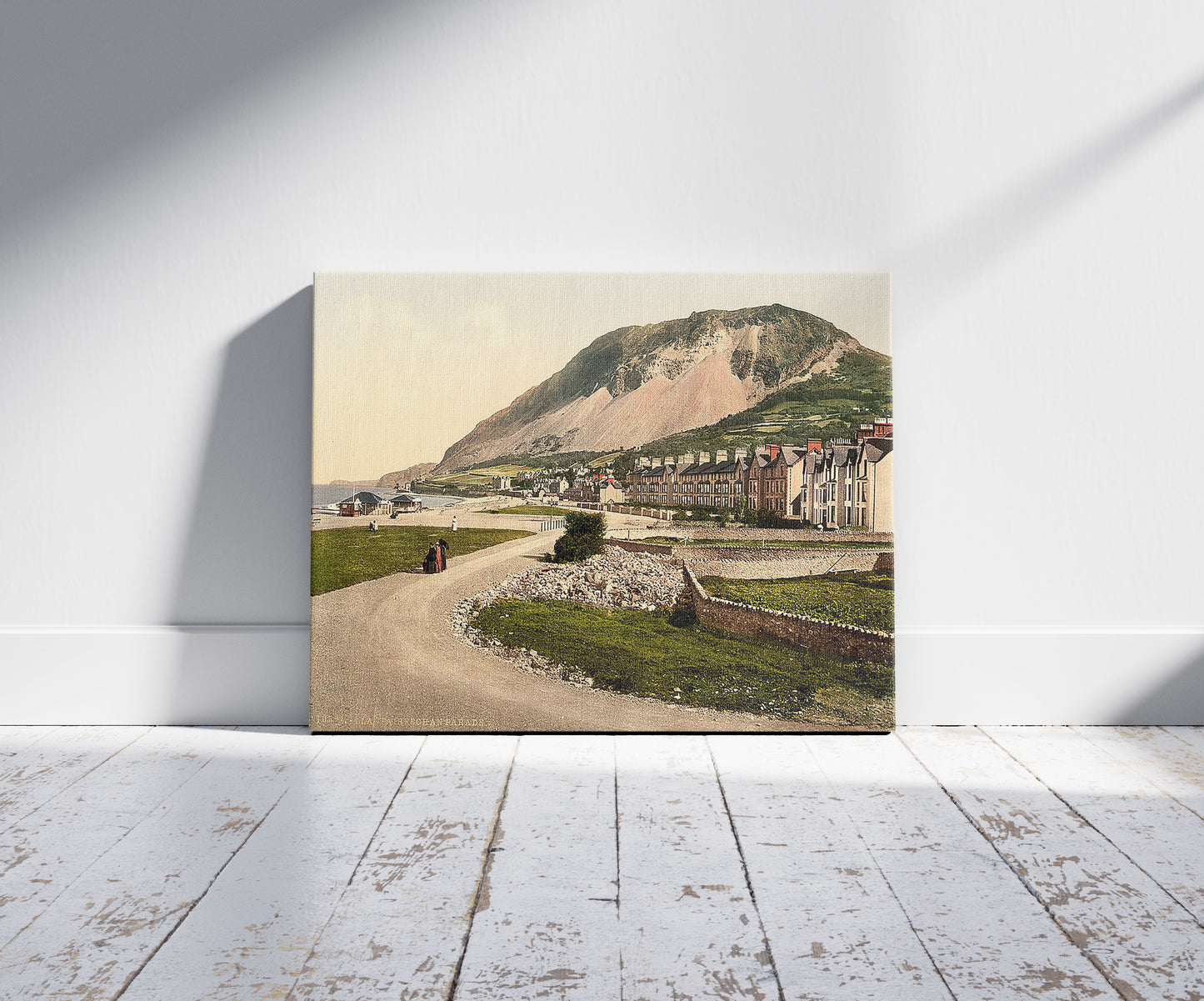 A picture of The parade, Llanfairfechan, Wales, a mockup of the print leaning against a wall