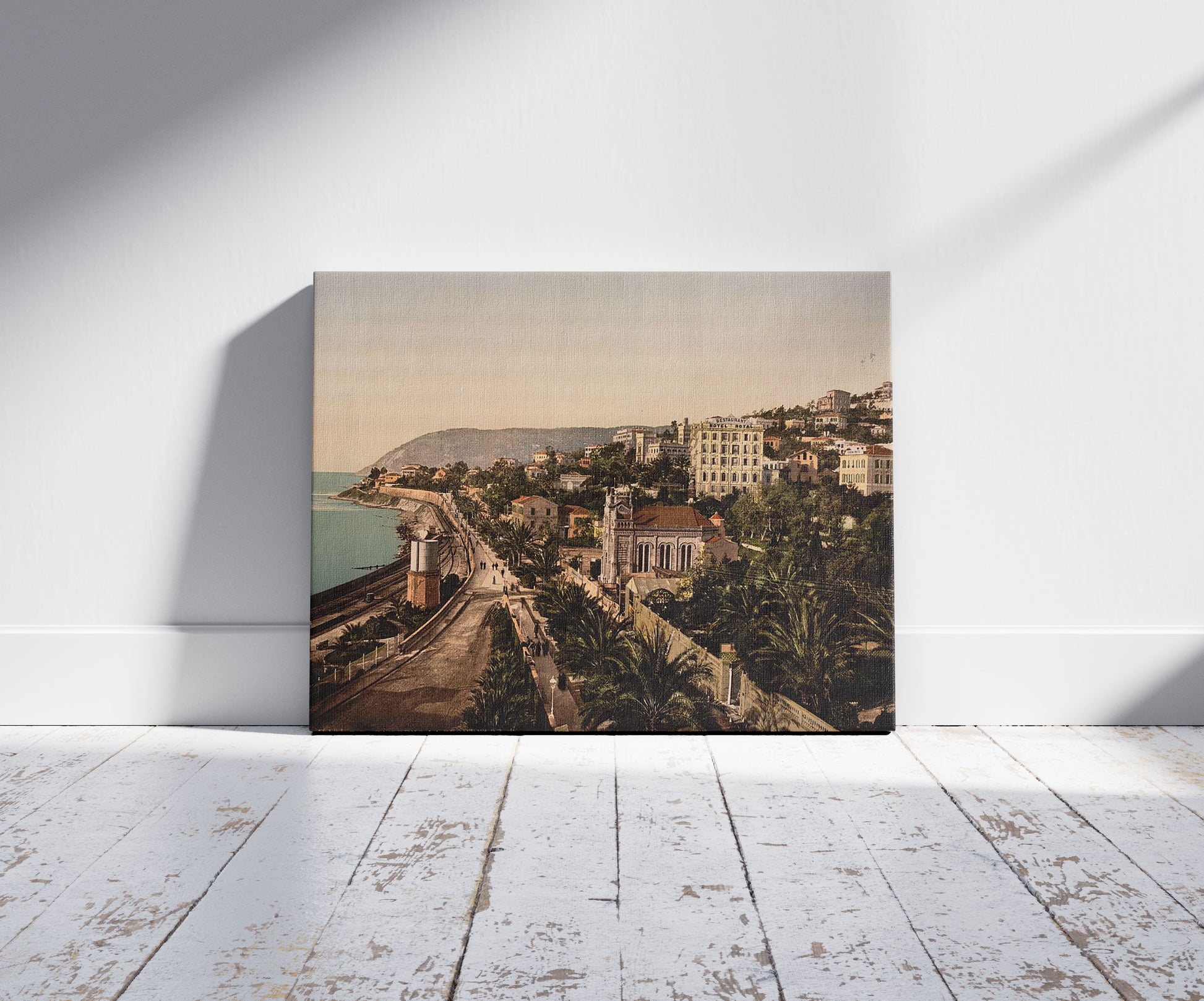 A picture of The promenade, San Remo, Riviera, a mockup of the print leaning against a wall