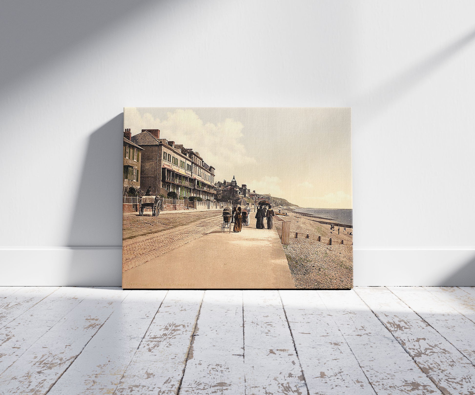 A picture of The promenade, Sandgate, England, a mockup of the print leaning against a wall