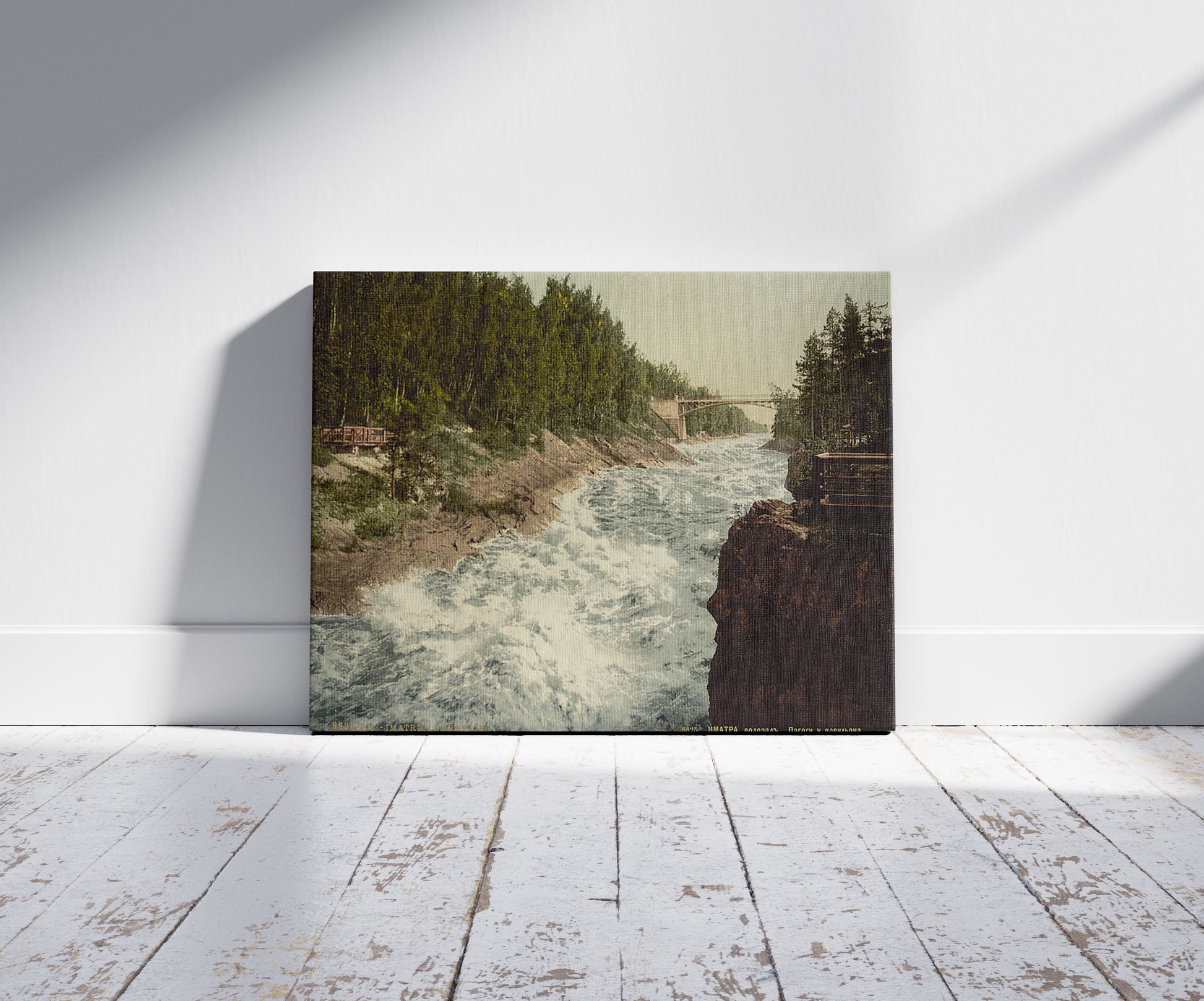 A picture of The rapids from the bridge, Imatra, Finland, a mockup of the print leaning against a wall