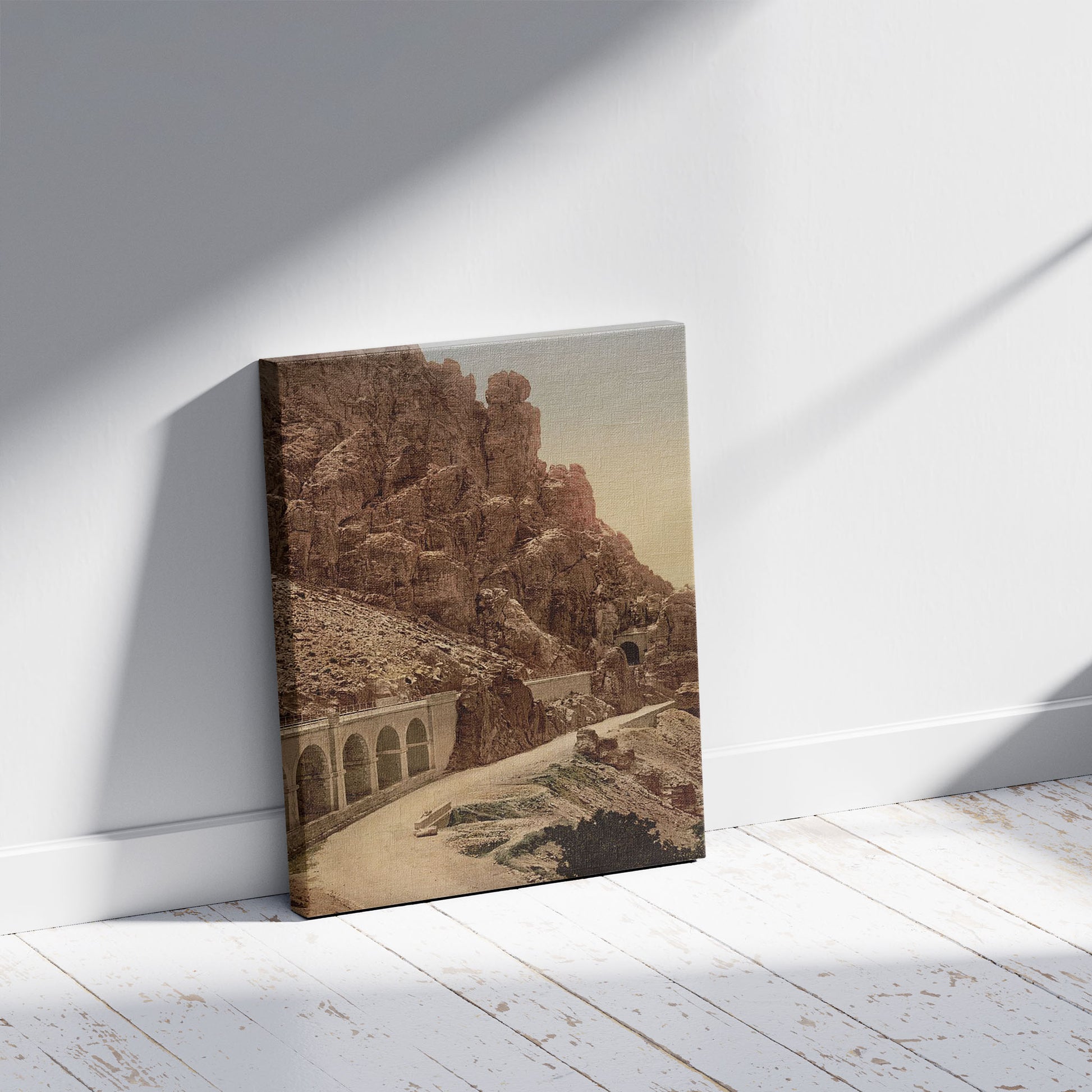 A picture of The ravine, II, El Cantara, Algeria, a mockup of the print leaning against a wall