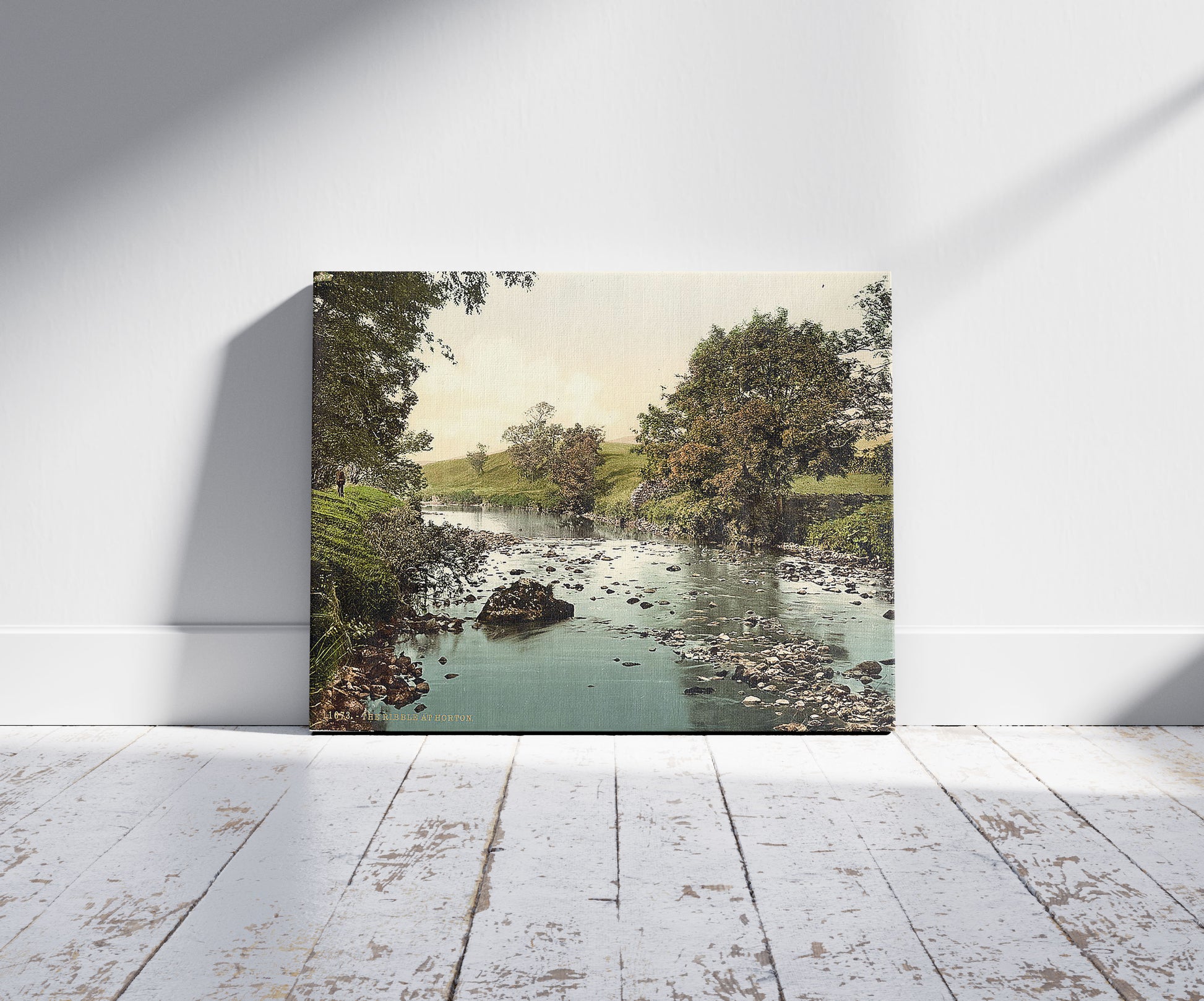 A picture of The Ribble at Horton, Yorkshire, England, a mockup of the print leaning against a wall