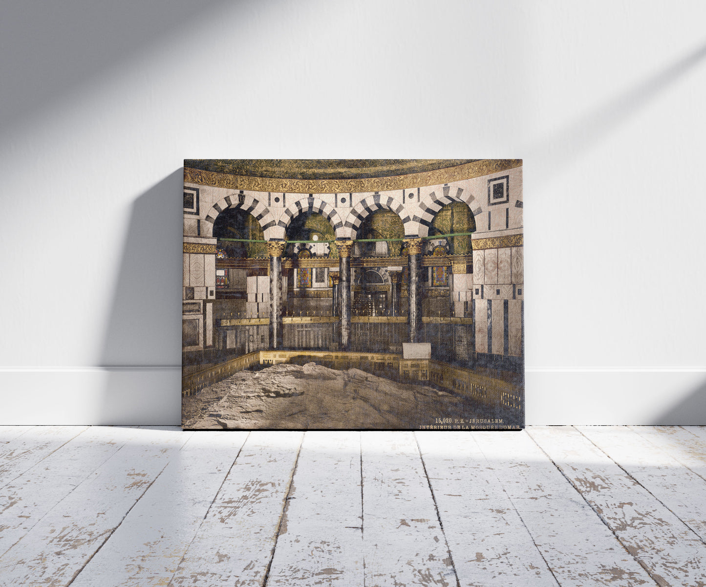 A picture of The rock in the Mosque of Omar, Jerusalem, a mockup of the print leaning against a wall