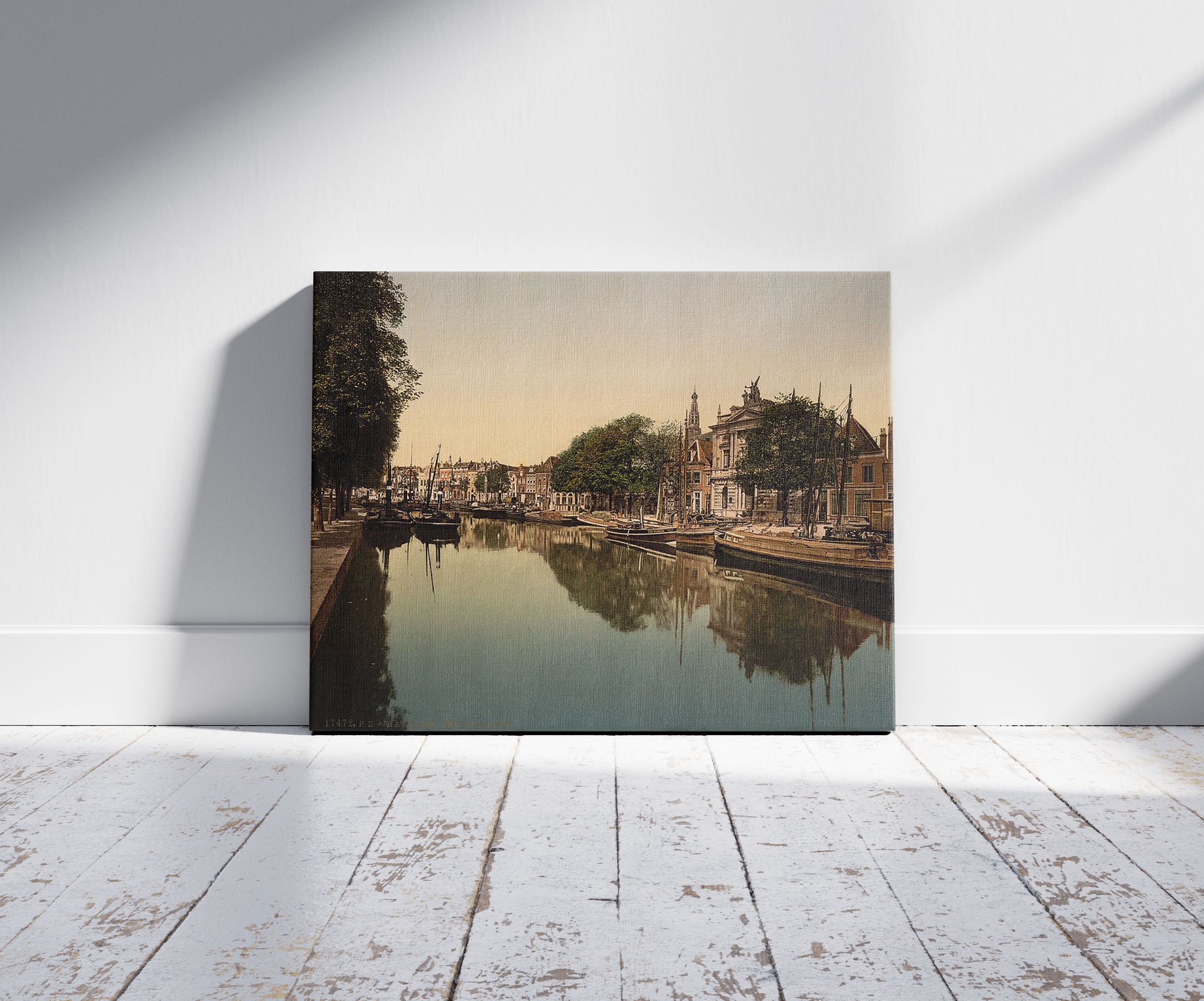 A picture of The Spaarne (river), Haarlem, Holland, a mockup of the print leaning against a wall