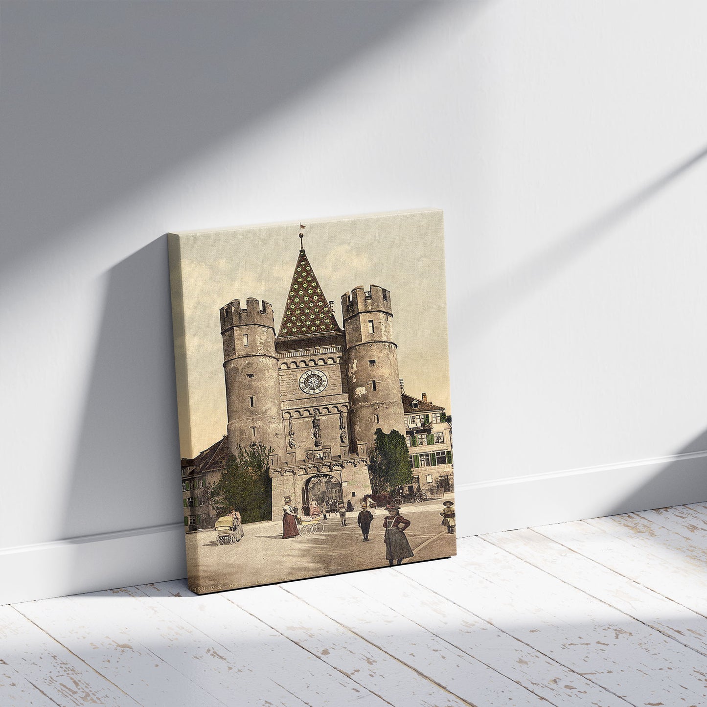 A picture of The Spalenthor, Basle, Switzerland, a mockup of the print leaning against a wall