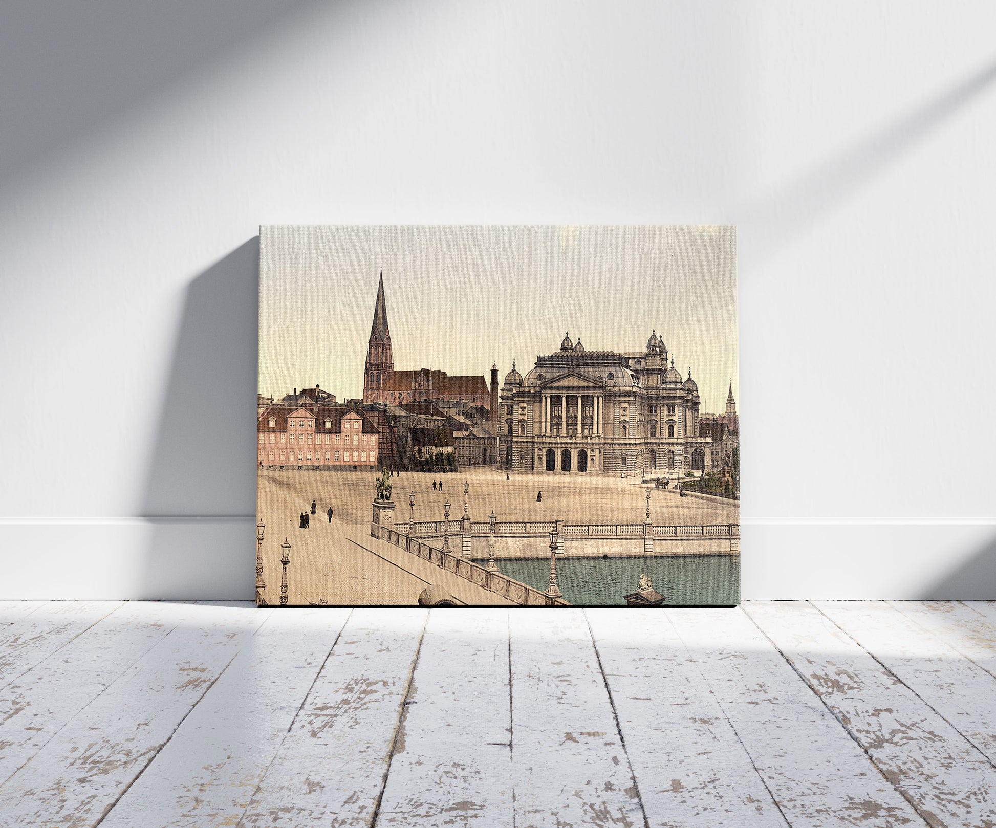 A picture of The theatre and cathedral, Schwerin, Mecklenburg-Schwerin, Germany, a mockup of the print leaning against a wall