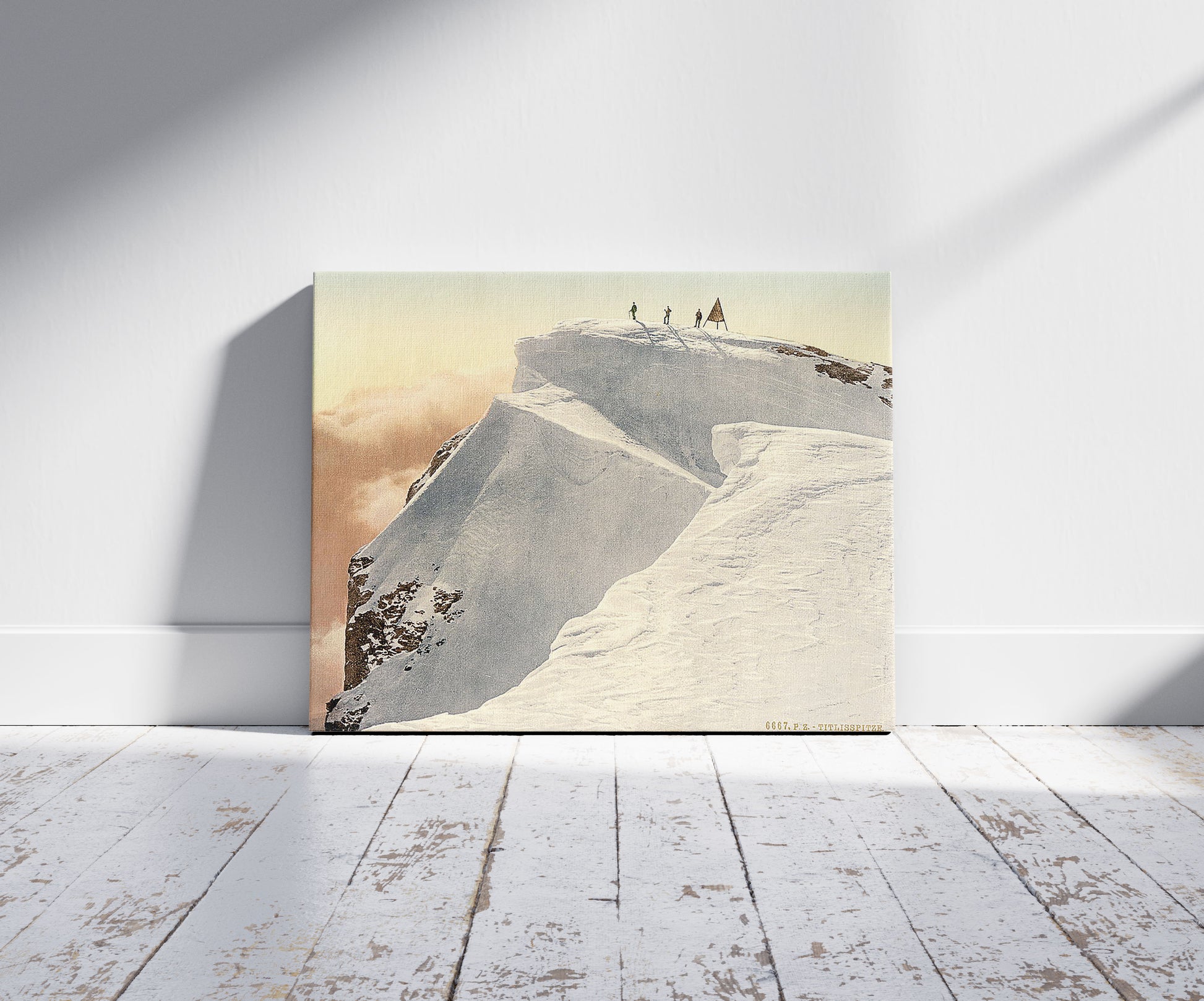 A picture of The Titlis Spitze, Unterwald, Switzerland, a mockup of the print leaning against a wall