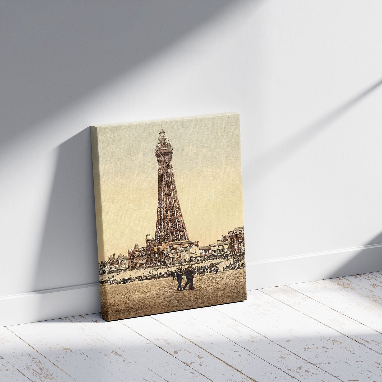 A picture of The Tower, Blackpool, England, a mockup of the print leaning against a wall