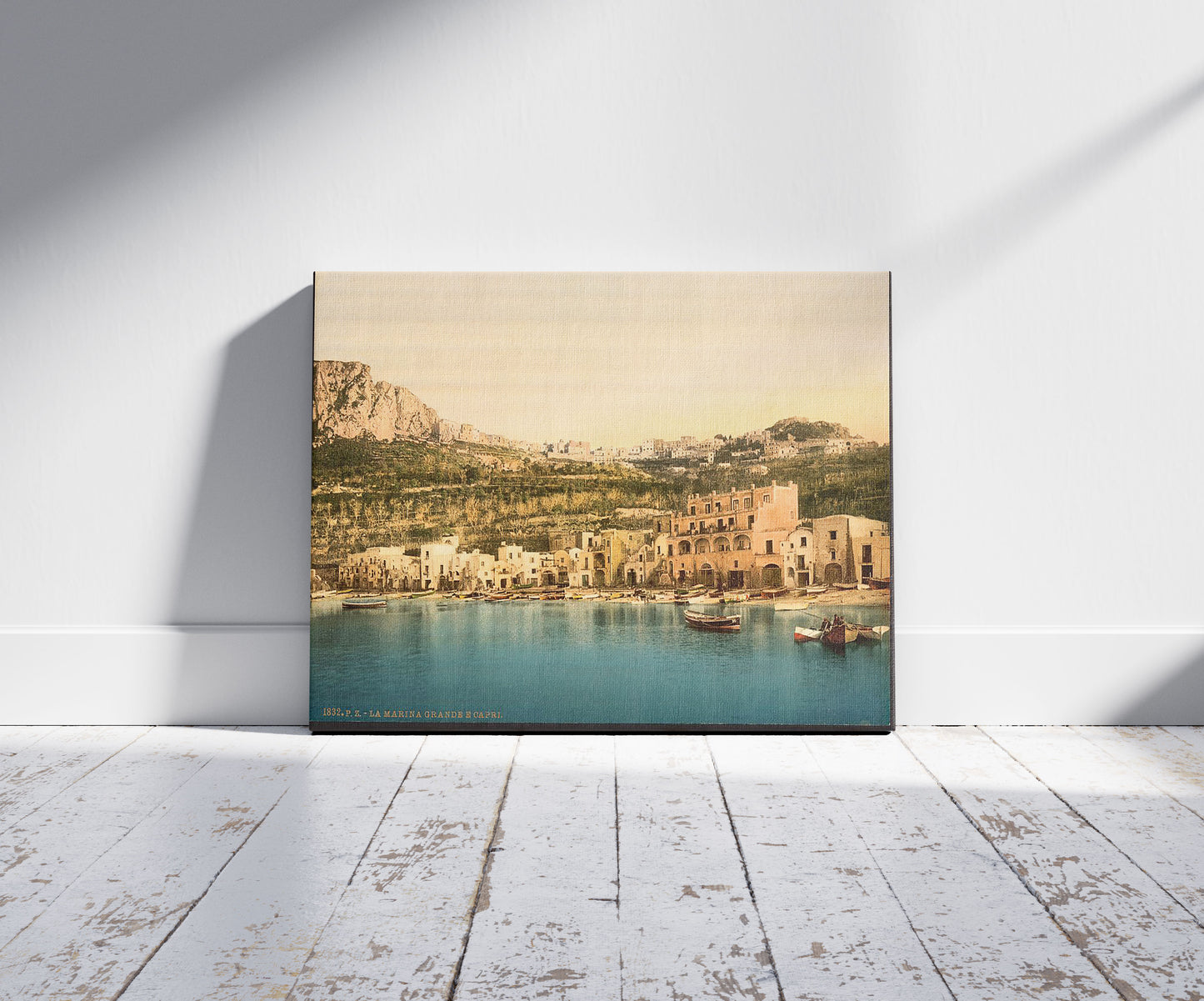 A picture of The town, Capri Island, Italy, a mockup of the print leaning against a wall