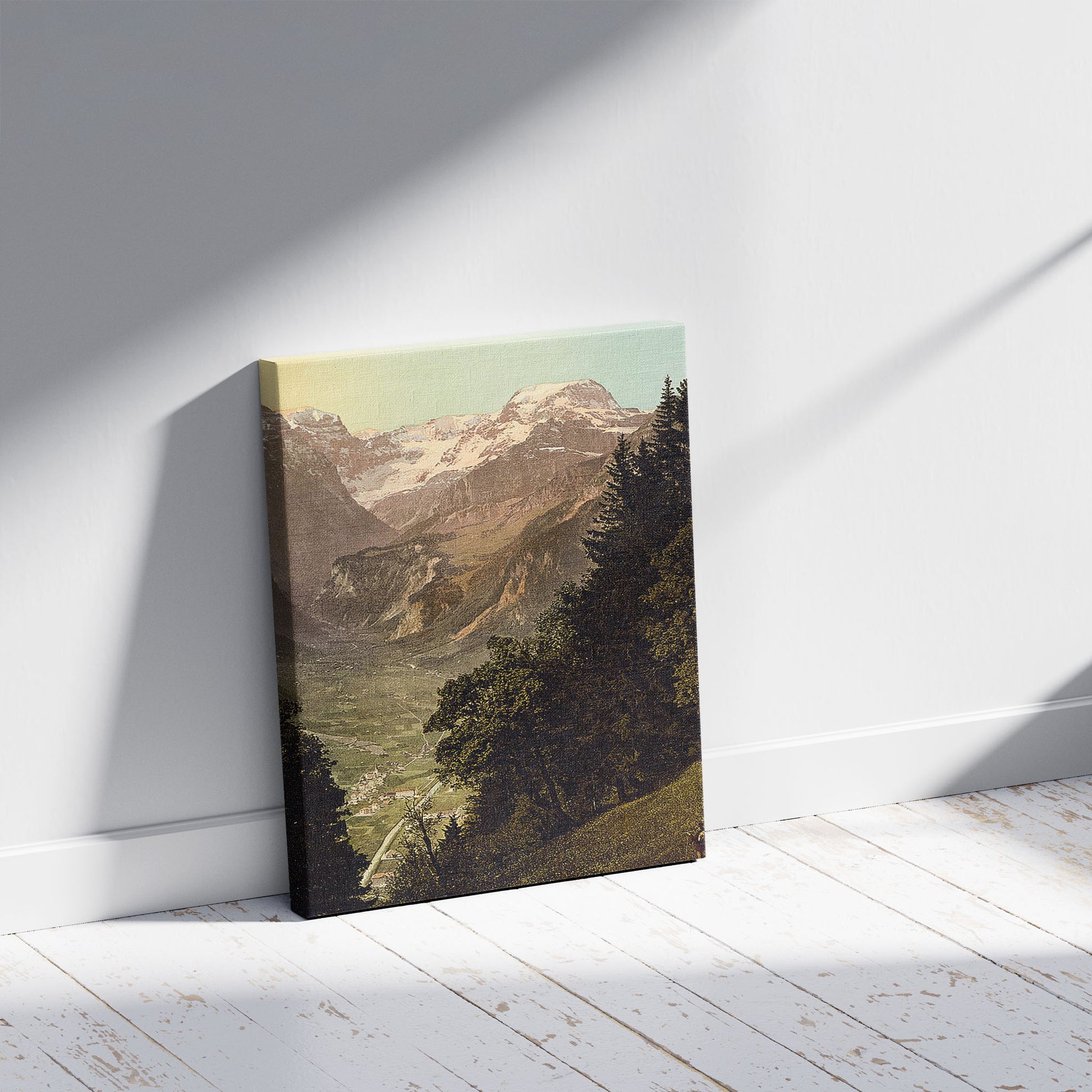 A picture of The Valley of Linth (Lintthal) and the Todi, Glarus, Switzerland, a mockup of the print leaning against a wall