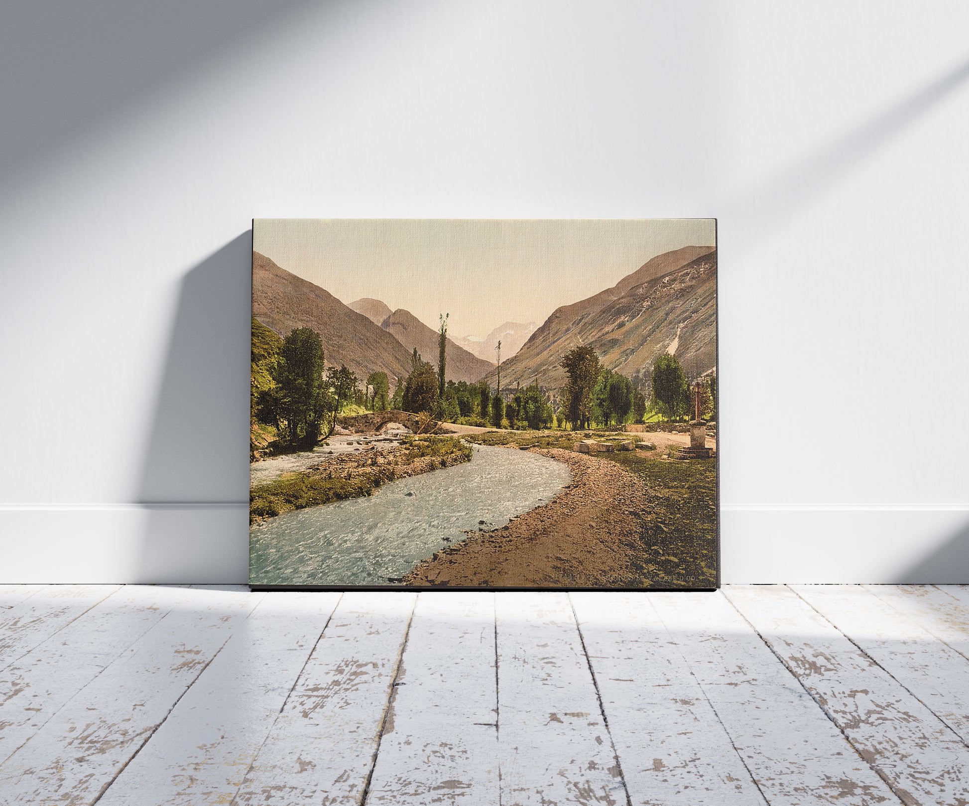 A picture of The Valley of the d'Oô, Luchon, Pyrenees, France, a mockup of the print leaning against a wall