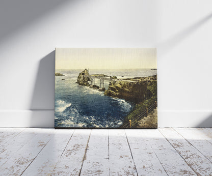 A picture of The Virgin's Rock, Biarritz, Pyrenees, France, a mockup of the print leaning against a wall