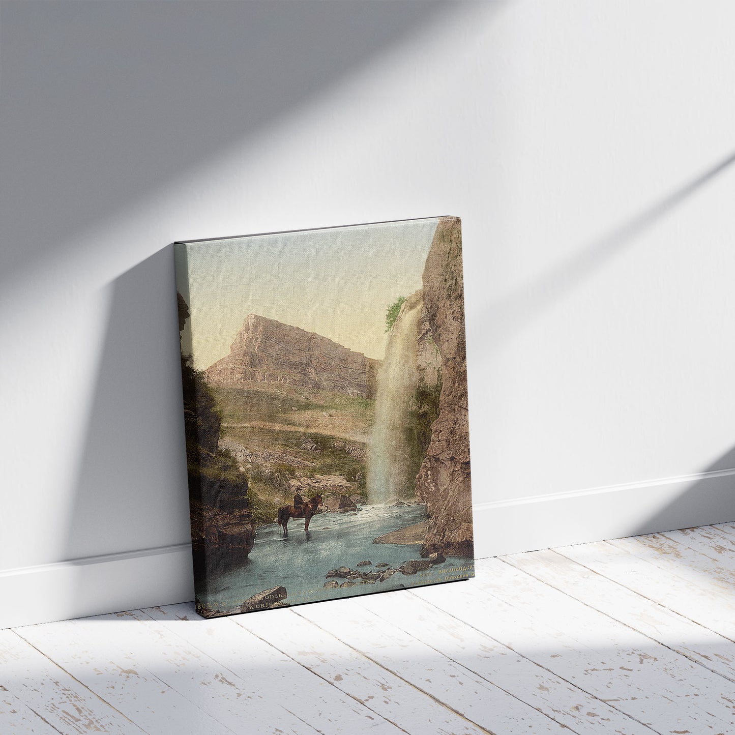 A picture of The waterfall Orjechowoi Balkje, Kisslowodzk, (i.e., Kislovodsk), Russia, a mockup of the print leaning against a wall