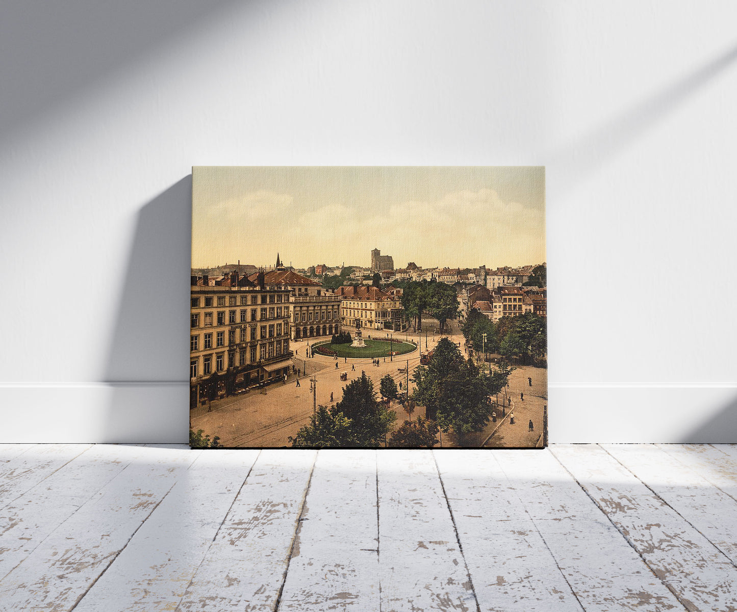 A picture of Theatre Place, Liège, Belgium, a mockup of the print leaning against a wall