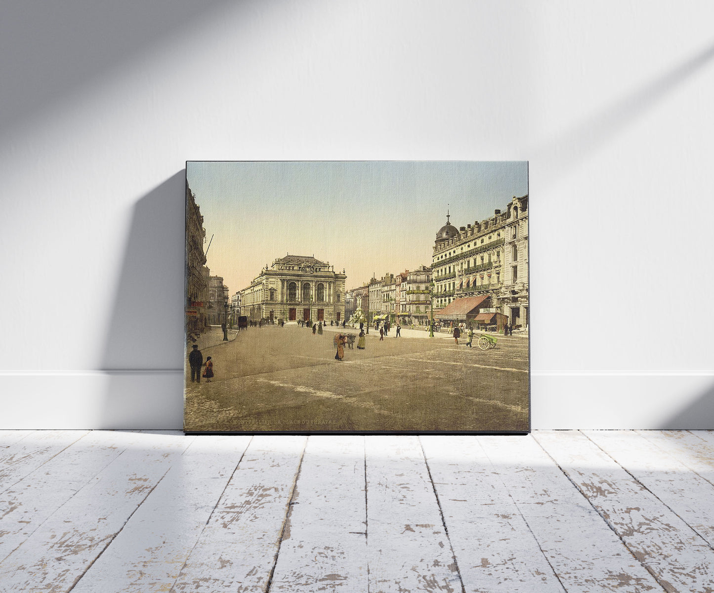 A picture of Theatre Place, Montpelier, France, a mockup of the print leaning against a wall