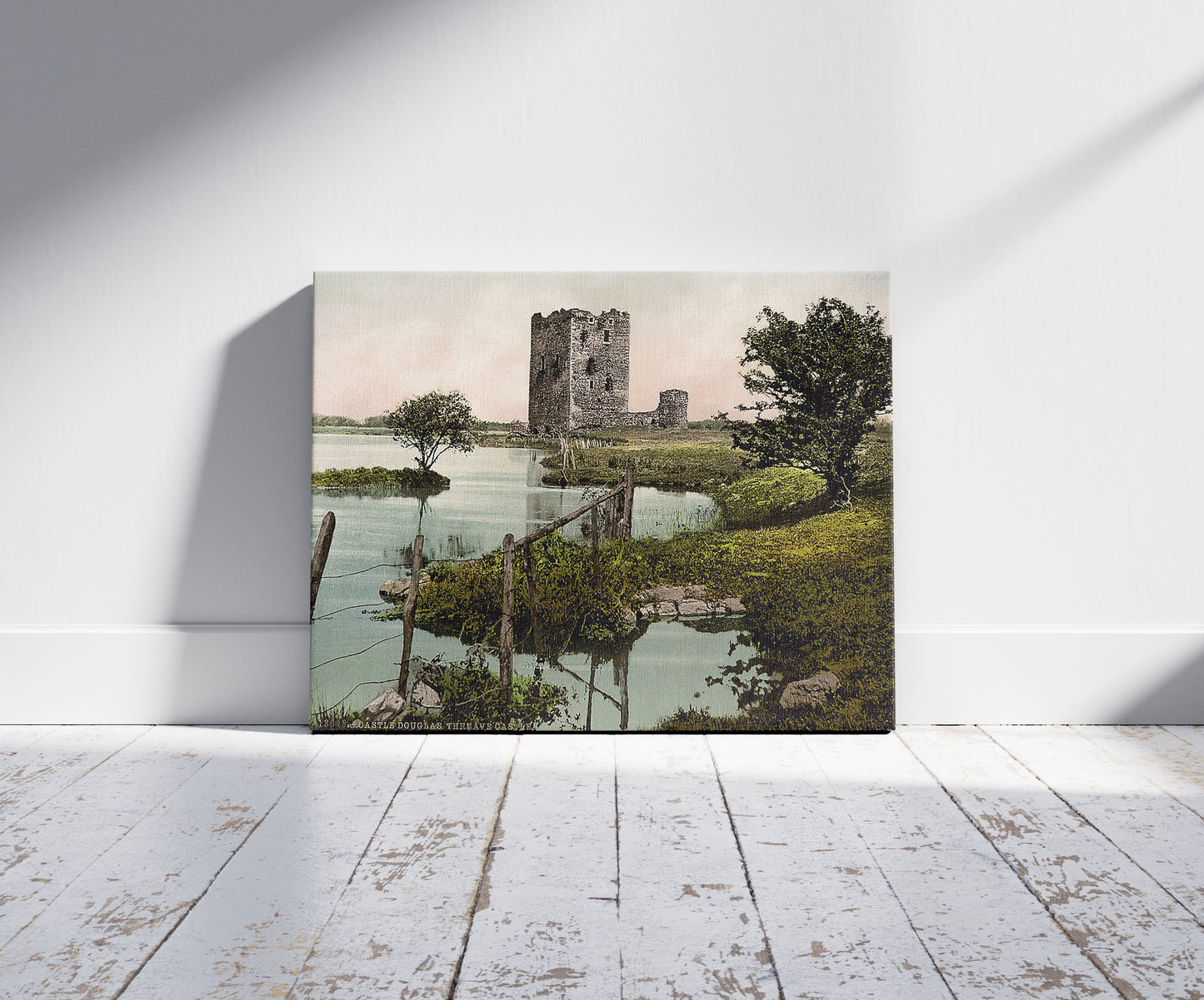 A picture of Threave Castle, Castle Douglas, Scotland, a mockup of the print leaning against a wall