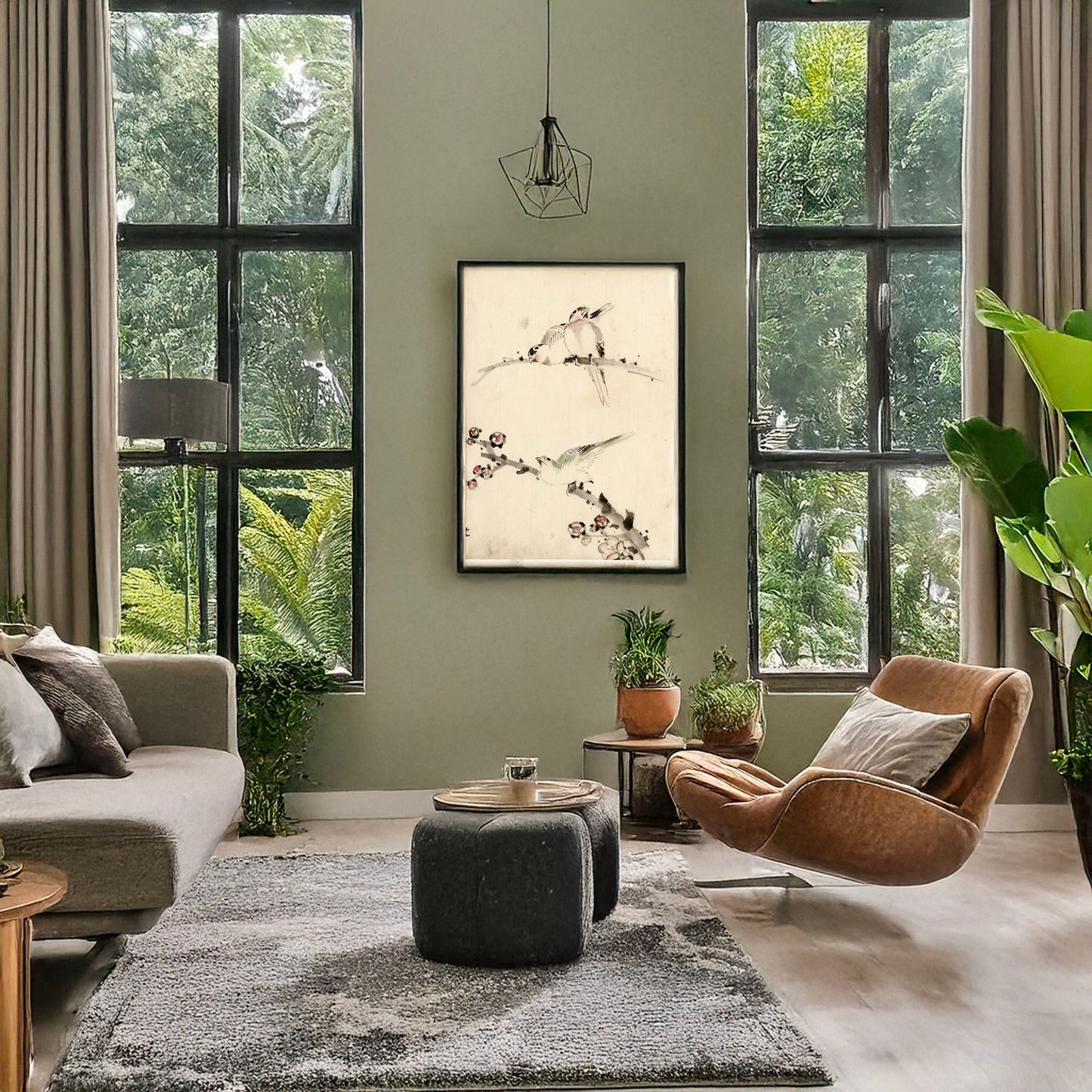 A picture of Three birds perched on branches, one with blossoms, a mockup of the print leaning against a wall