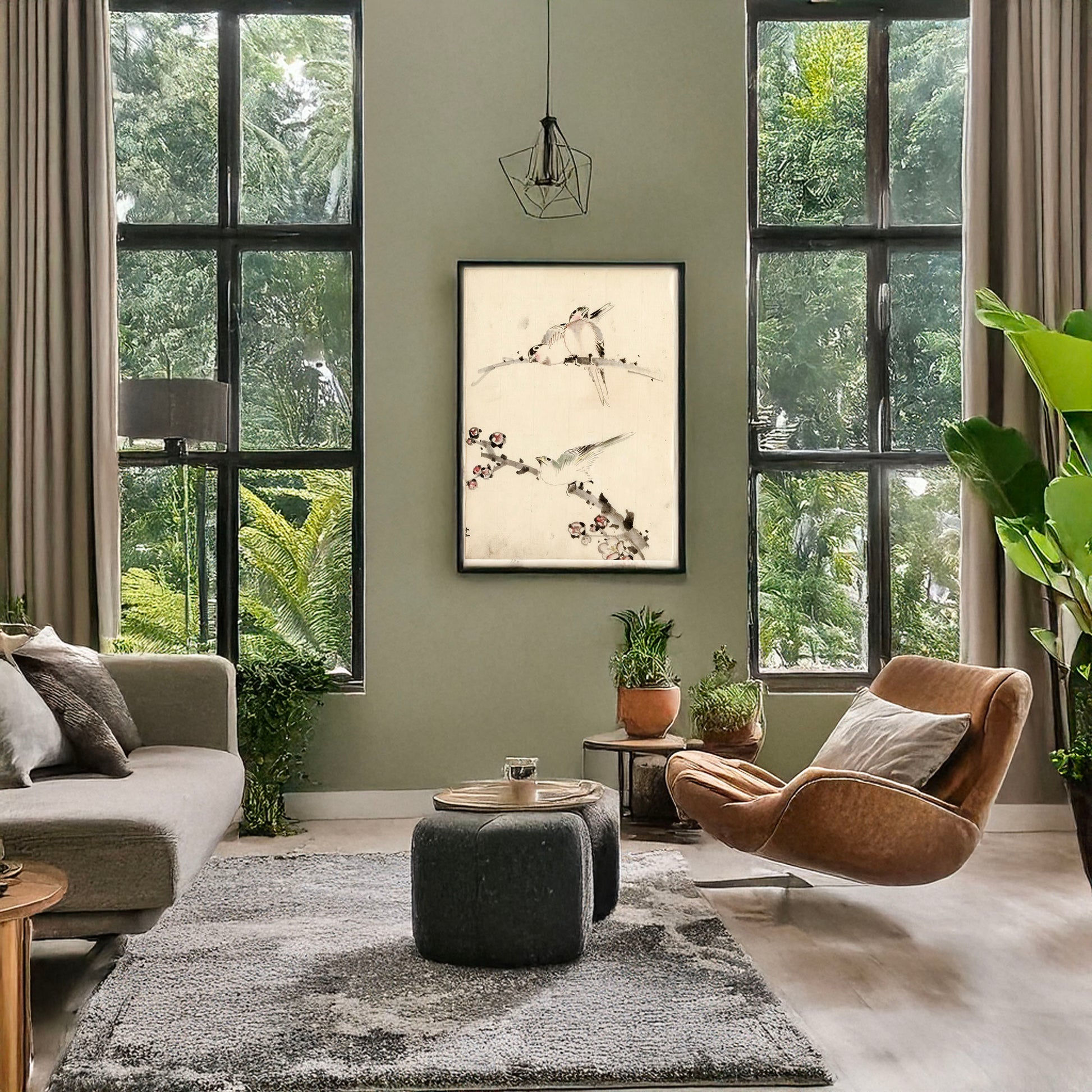 A picture of Three birds perched on branches, one with blossoms, a mockup of the print leaning against a wall